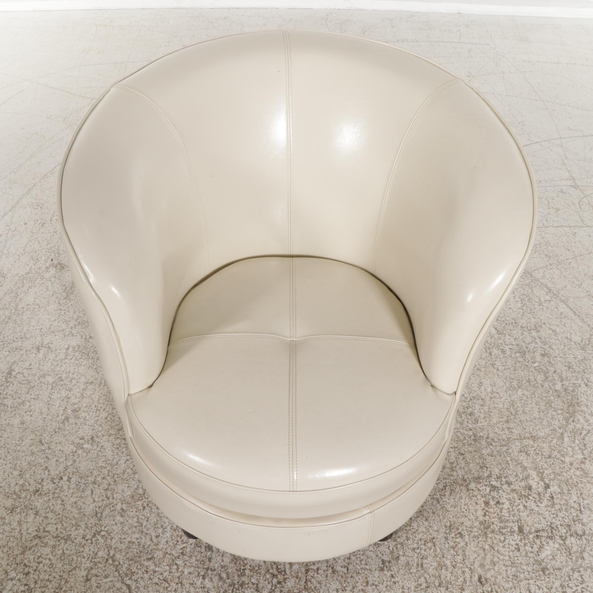 Contemporary Leather Upholstered Barrel Style Swivel Chair
