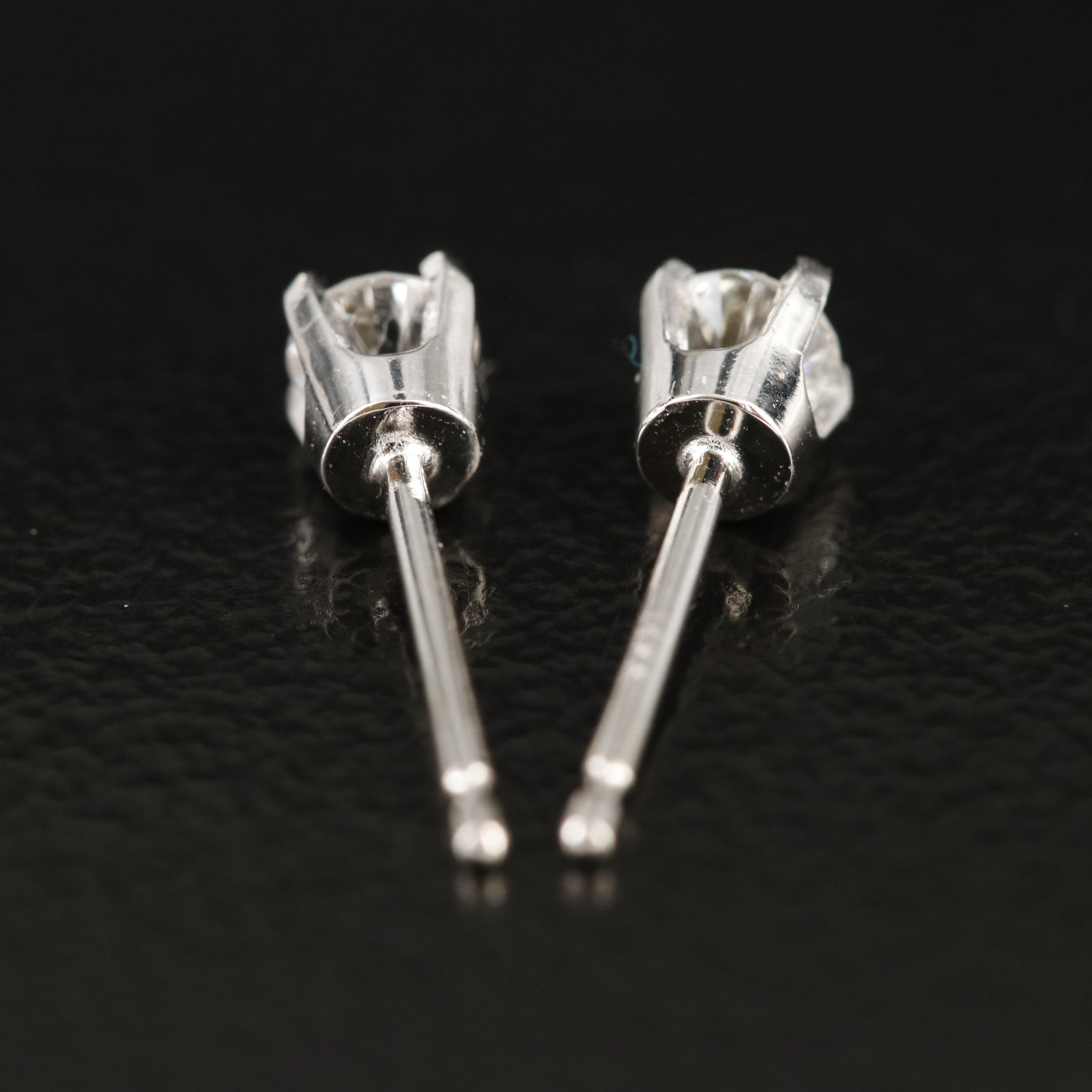 14K 0.20 CTW Diamond Stud Earrings