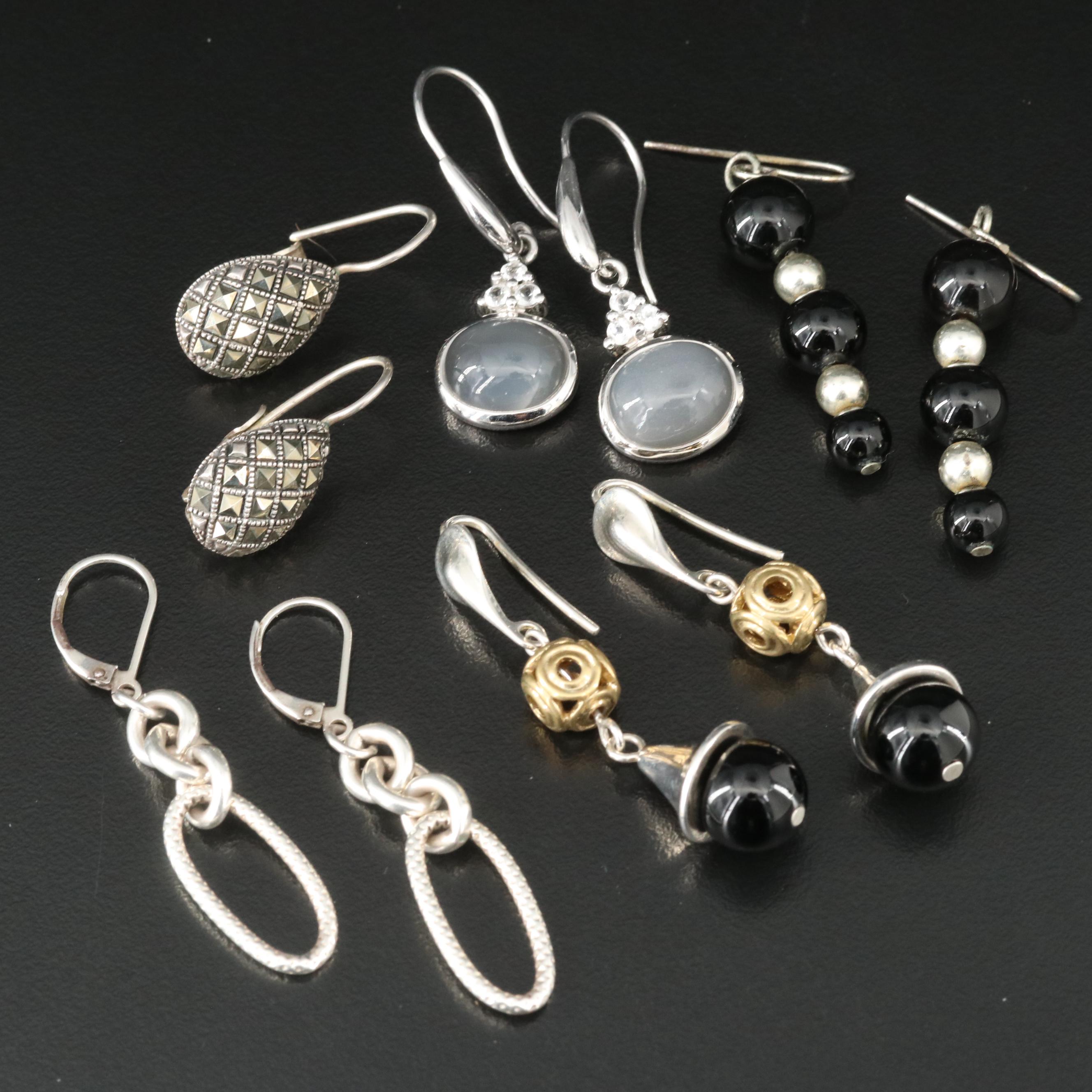 Robert Lee Morris, Moonstone and Topaz Featured in Earring Selection