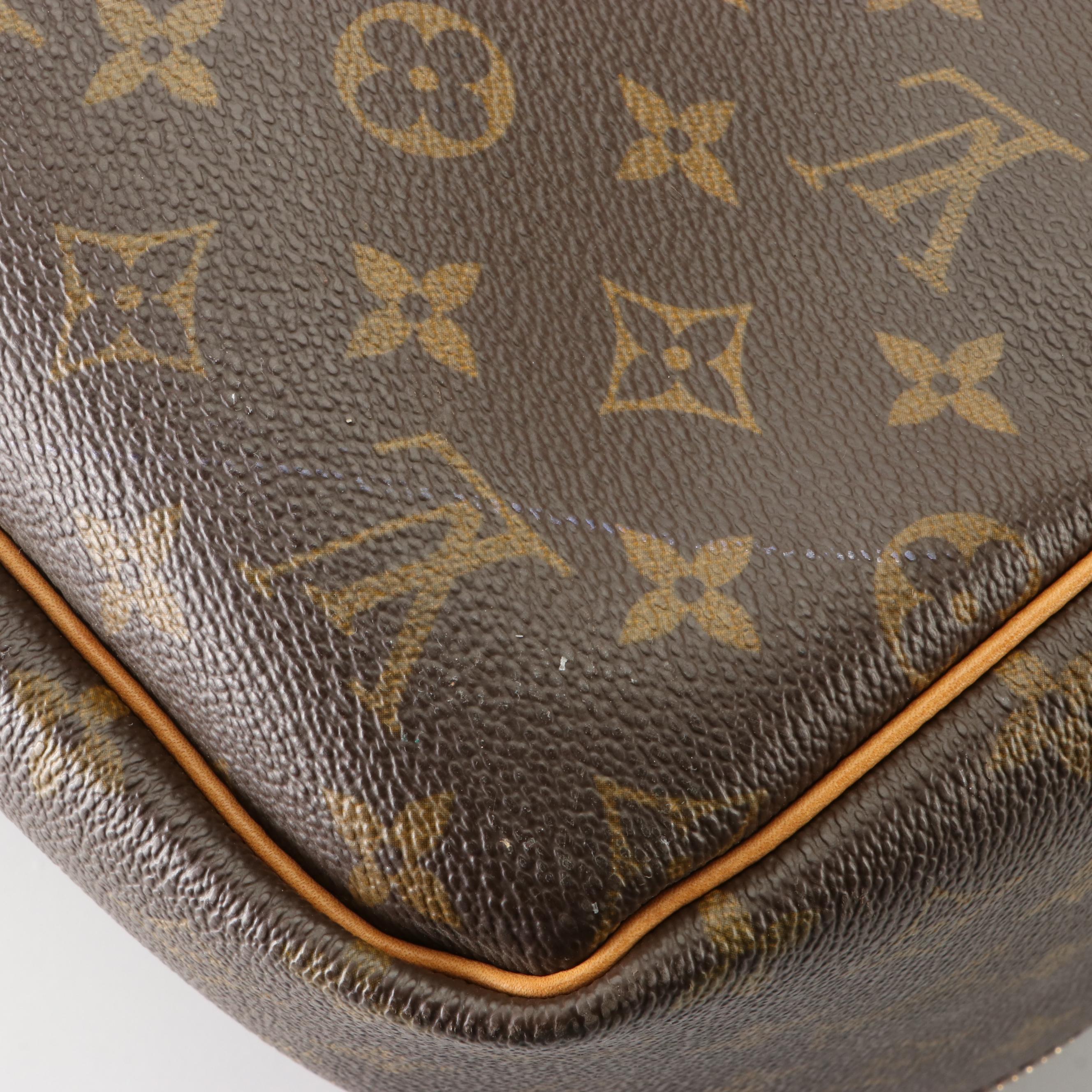 Louis Vuitton Sirius 65 Soft Suitcase in Monogram Canvas and Vachetta Leather