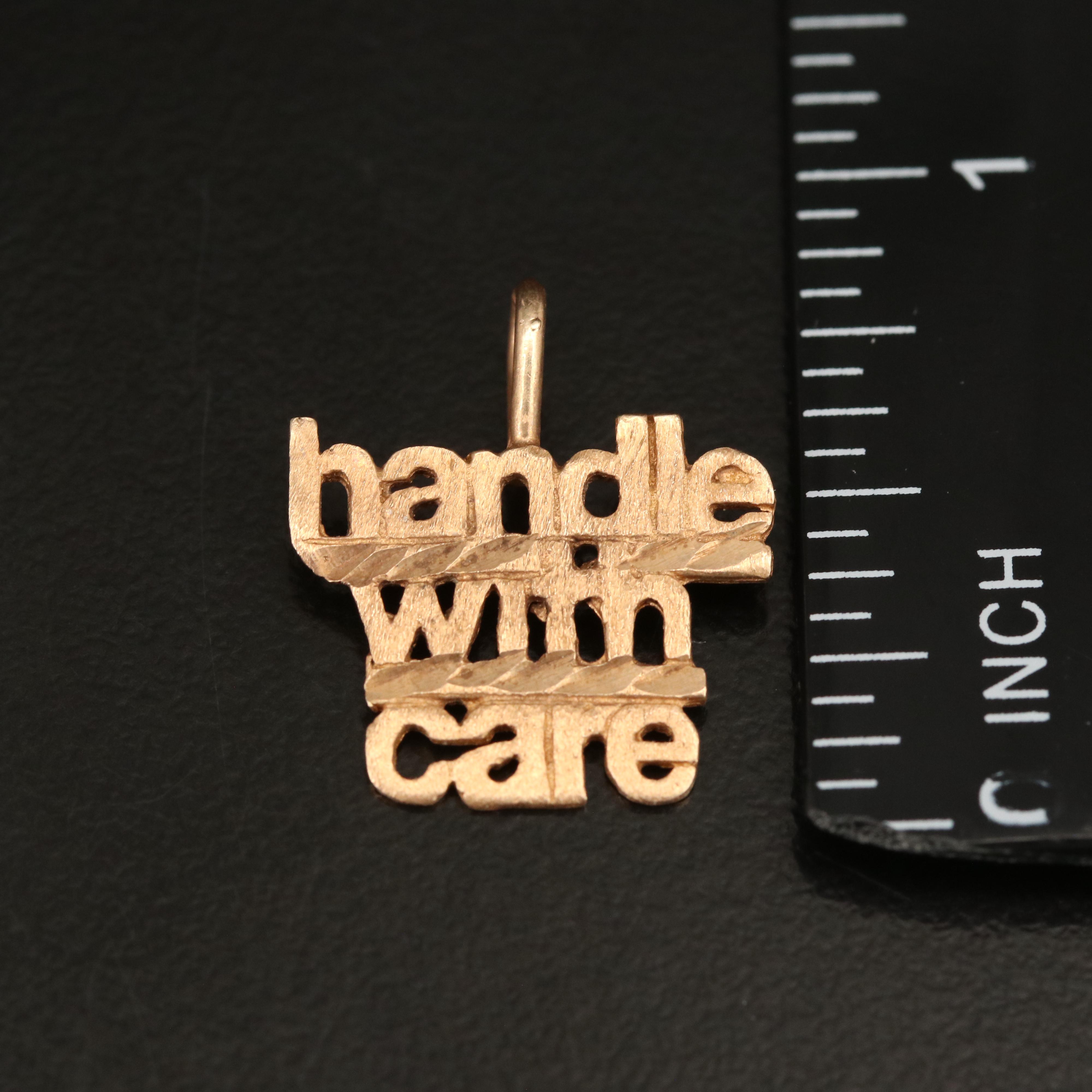 14K "Handle With Care" Pendant