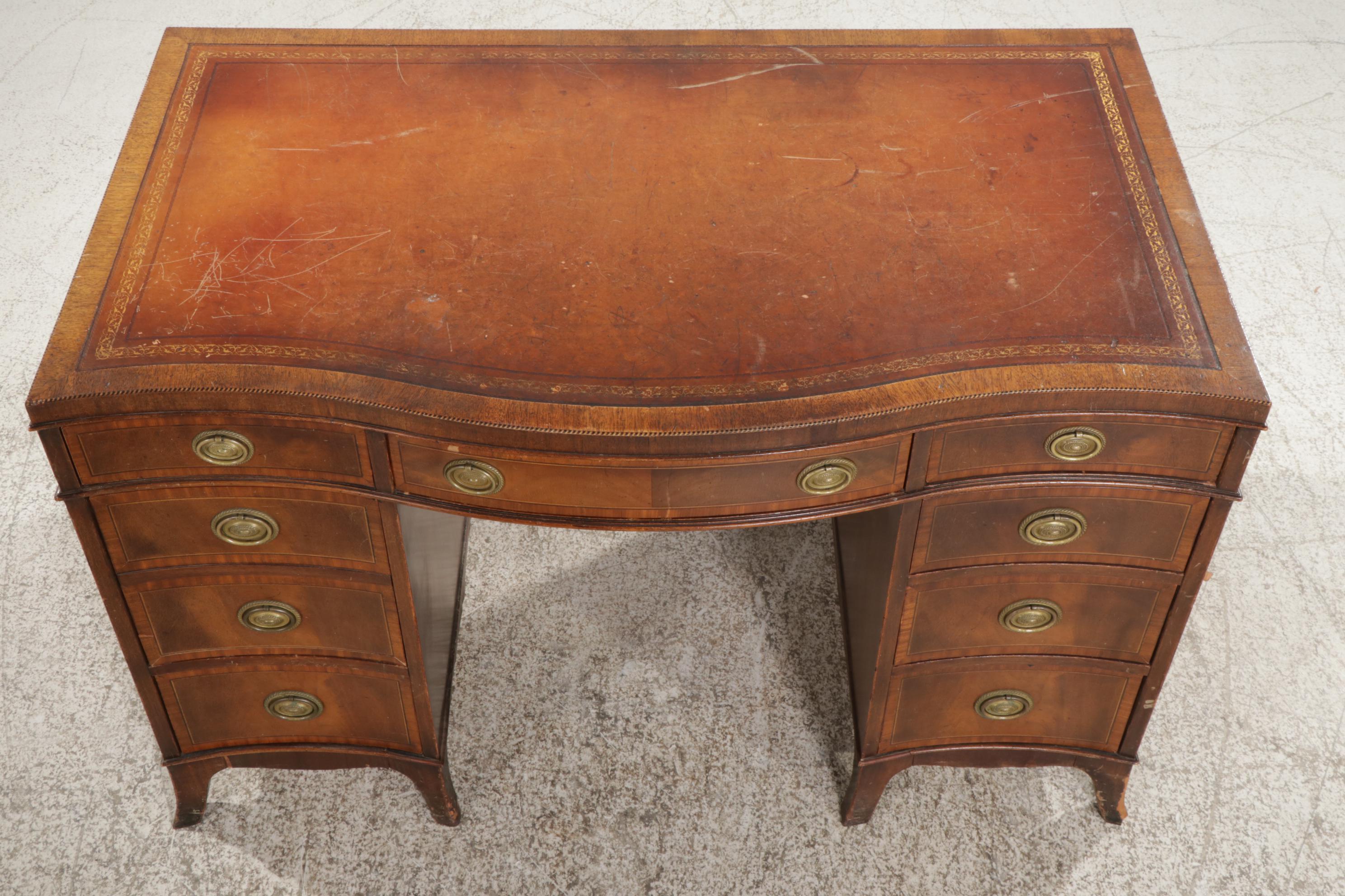 Sligh George III Style Mahogany and Leather Inset Serpentine Desk
