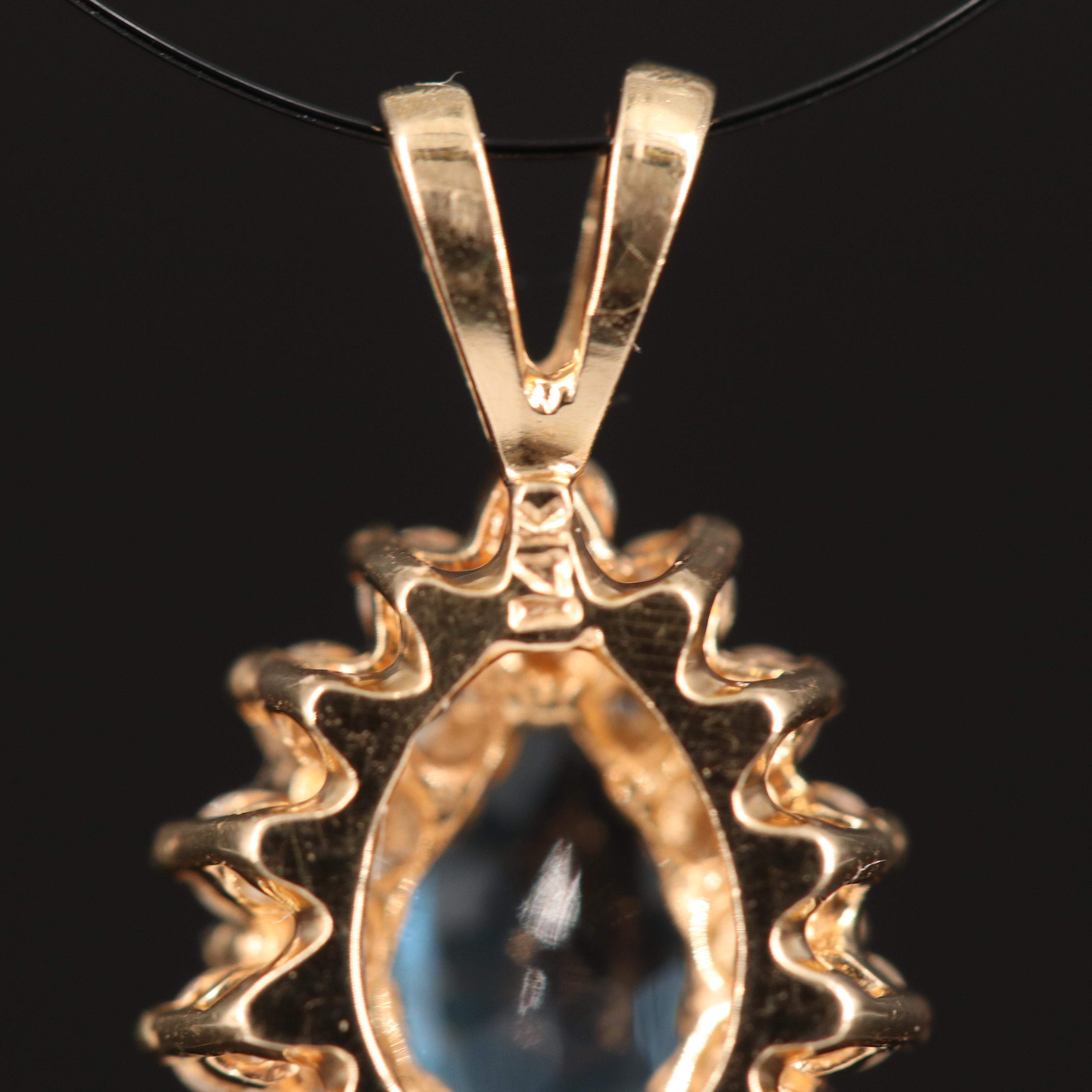 14K Swiss Blue Topaz and Diamond Pendant