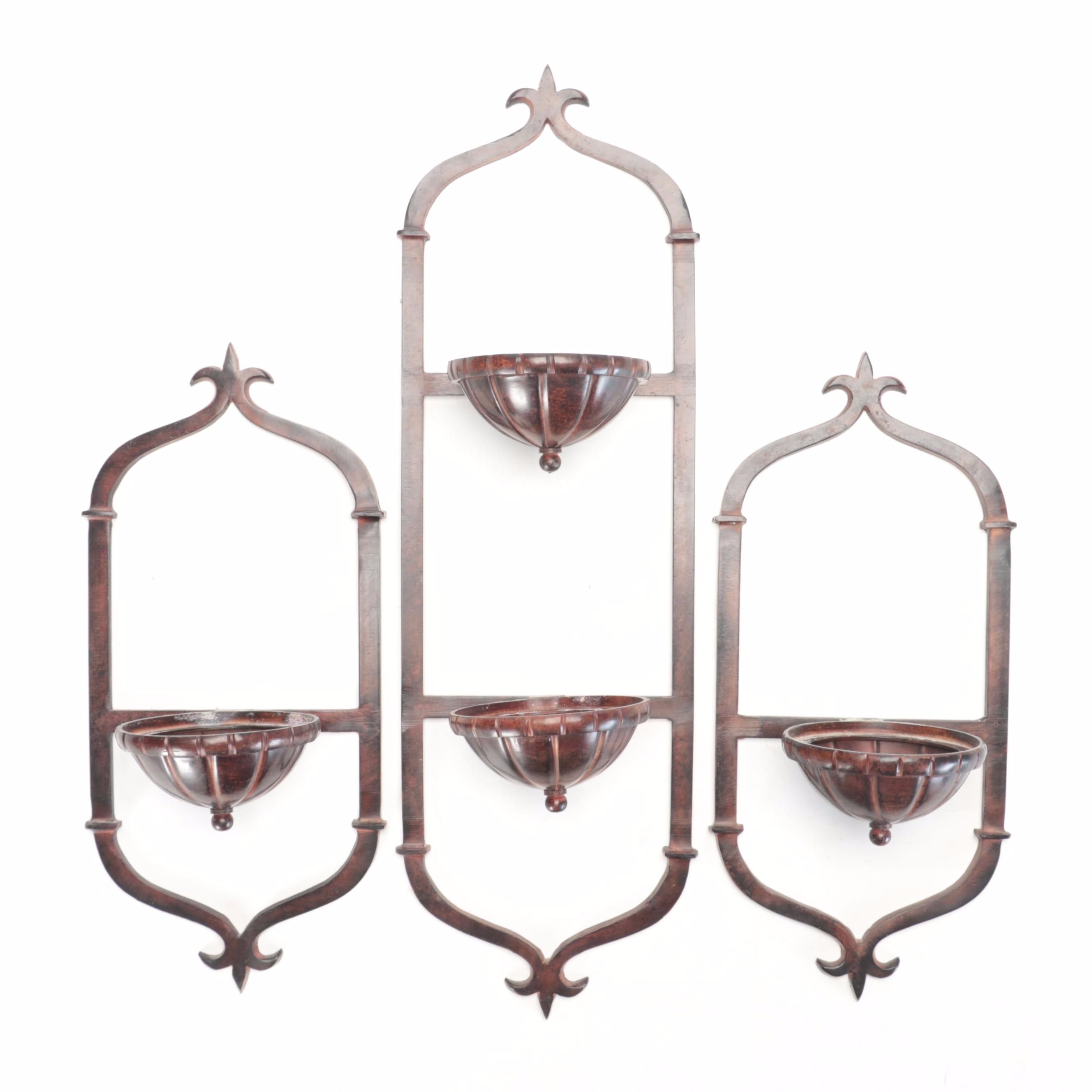 Scrolled Iron and Glass Wall Sconces