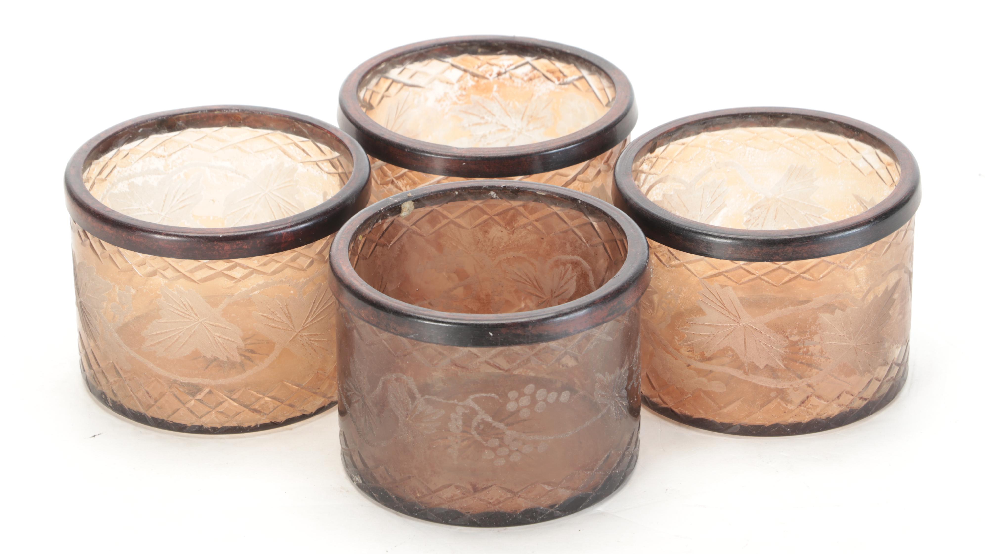 Scrolled Iron and Glass Wall Sconces