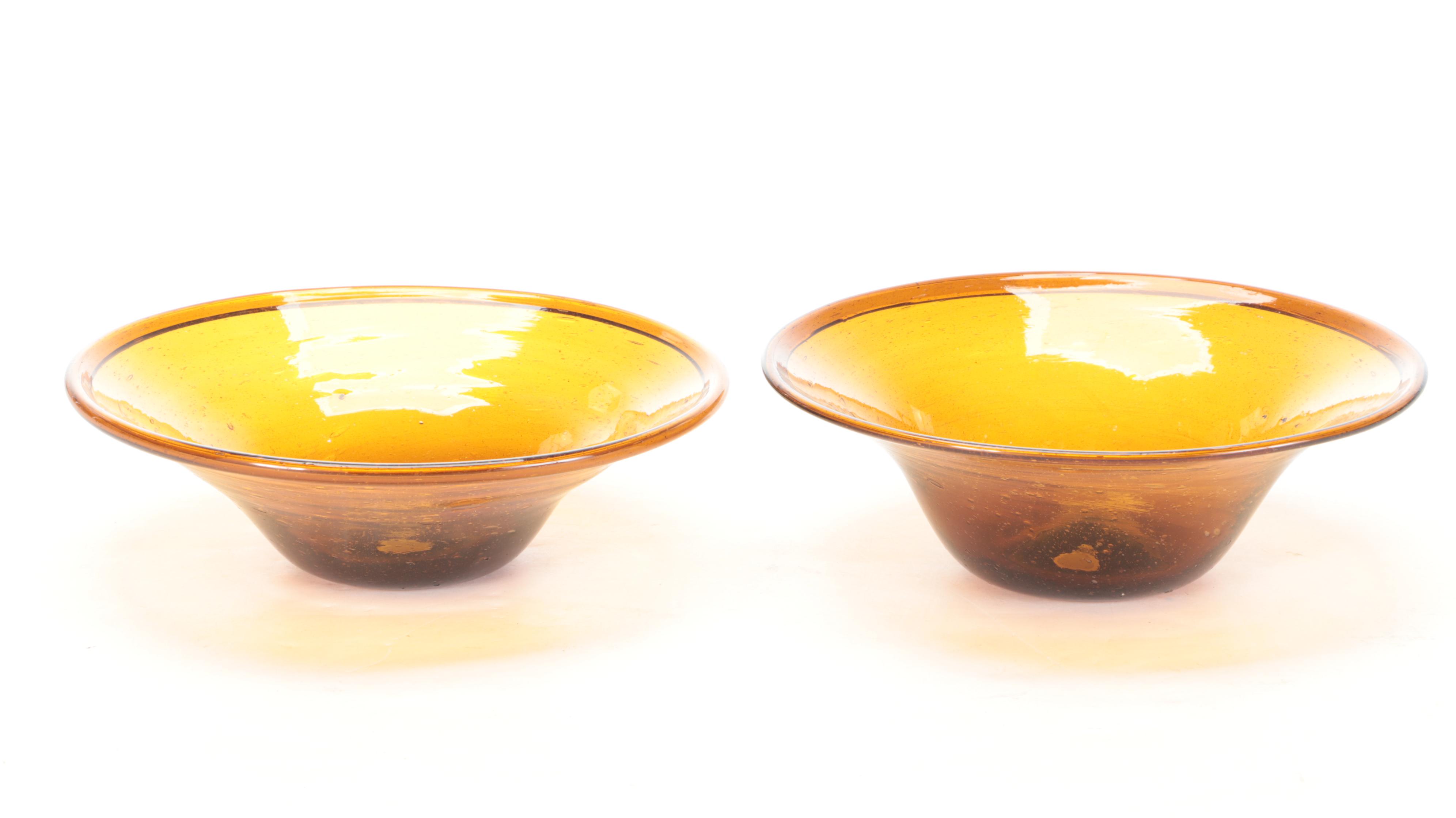 Scrolled Iron and Glass Wall Sconces