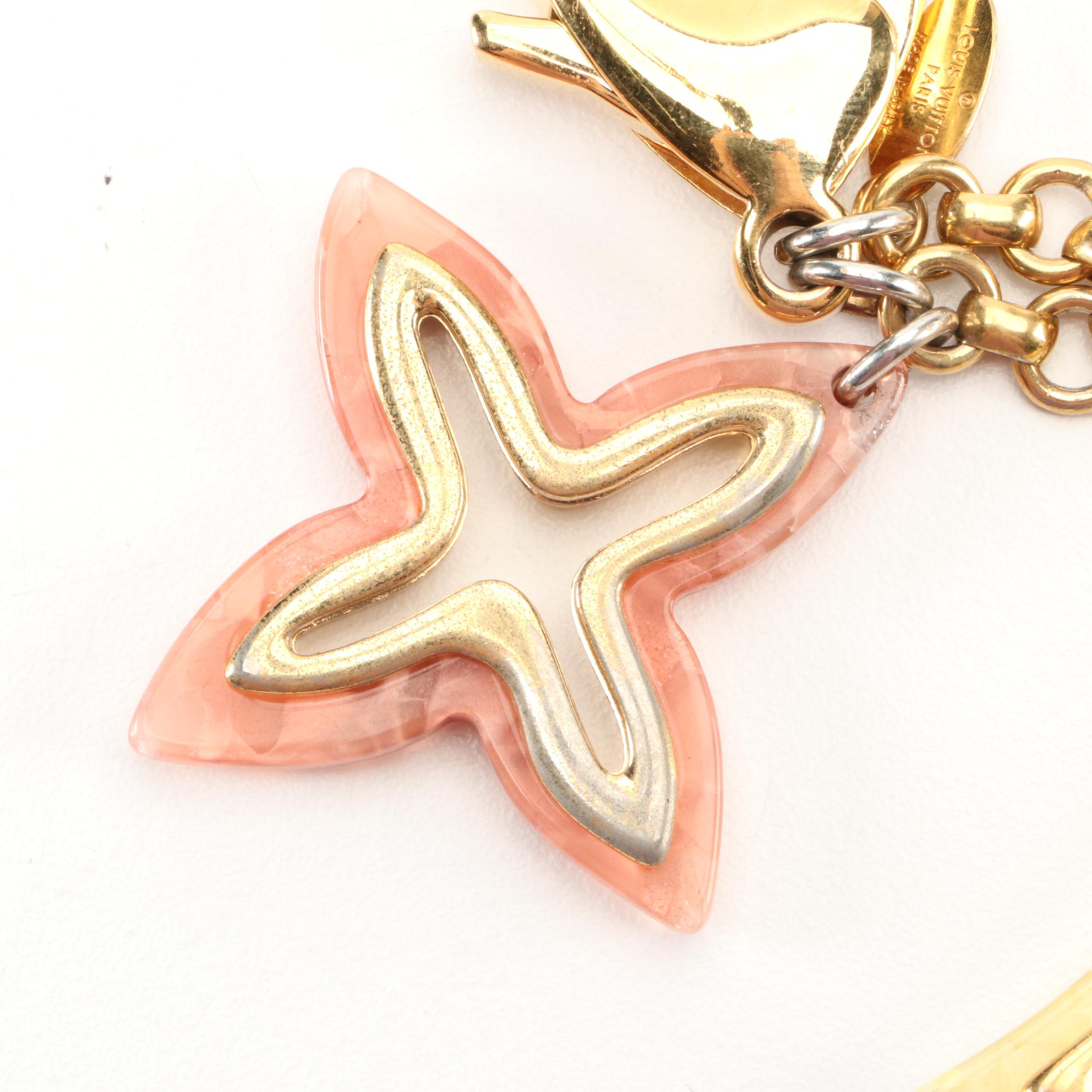 Louis Vuitton Insolence Bag Charm in Gold Tone Metal and Resin