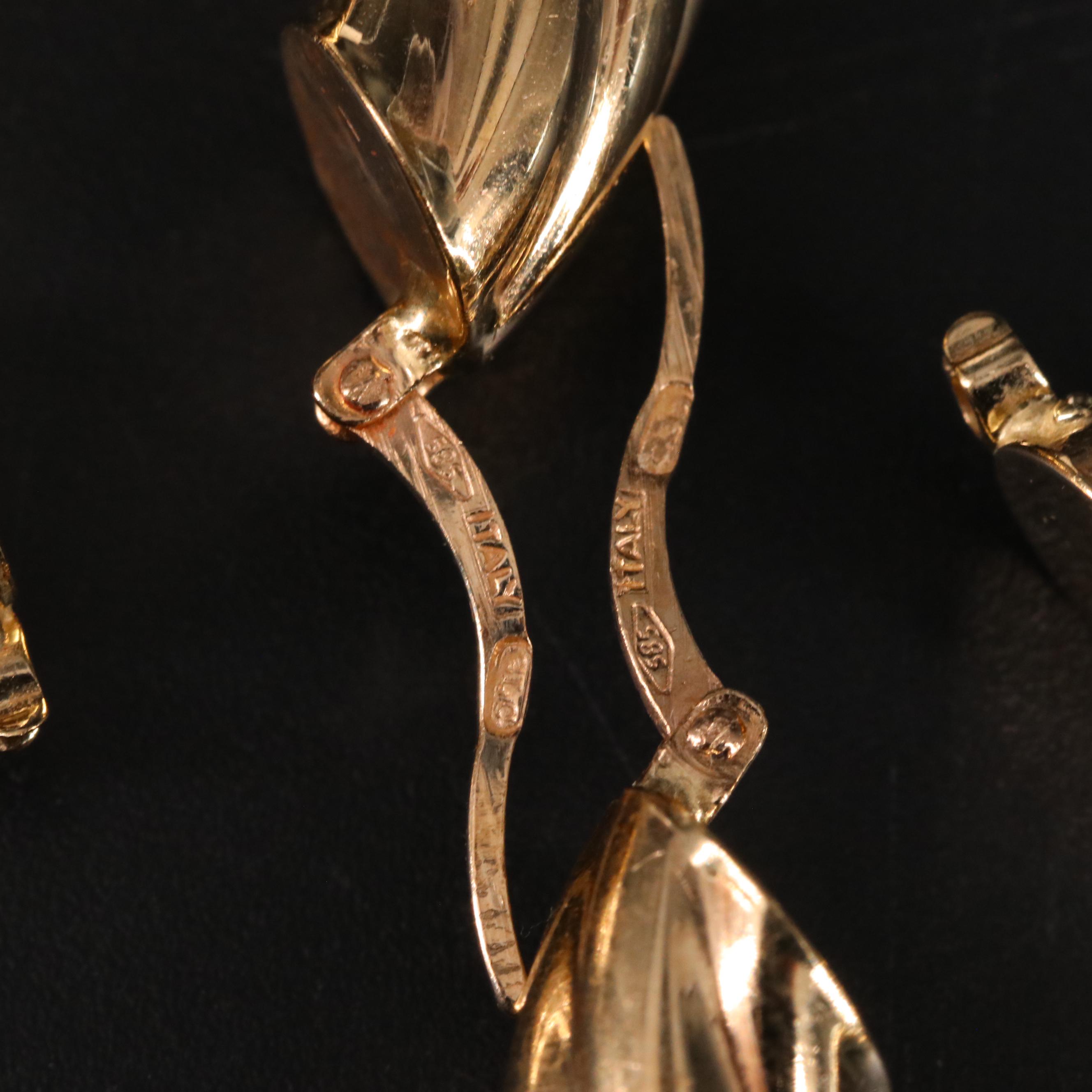 14K Twisted Oval Hoop Earrings