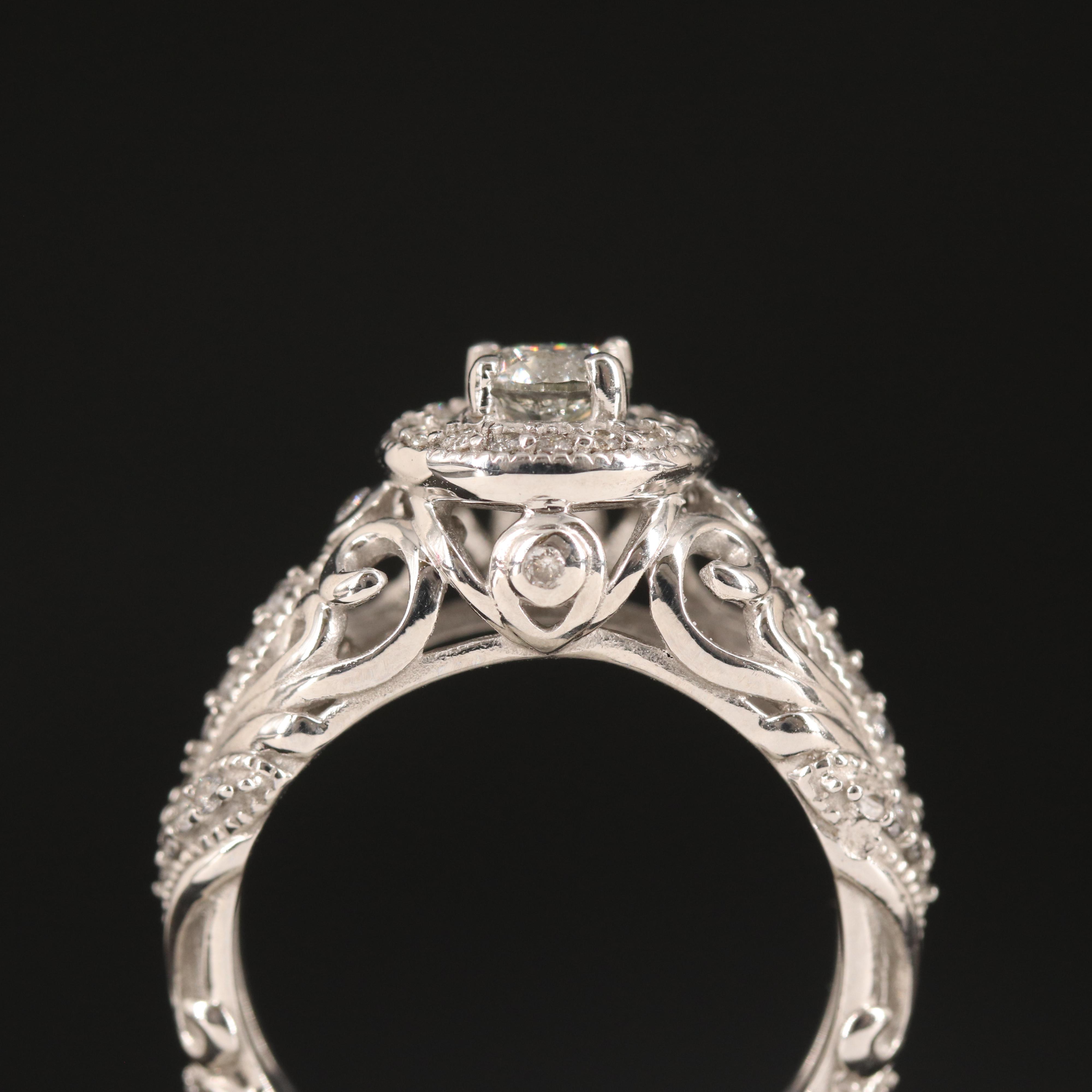 14K 0.57 CTW Diamond Ring