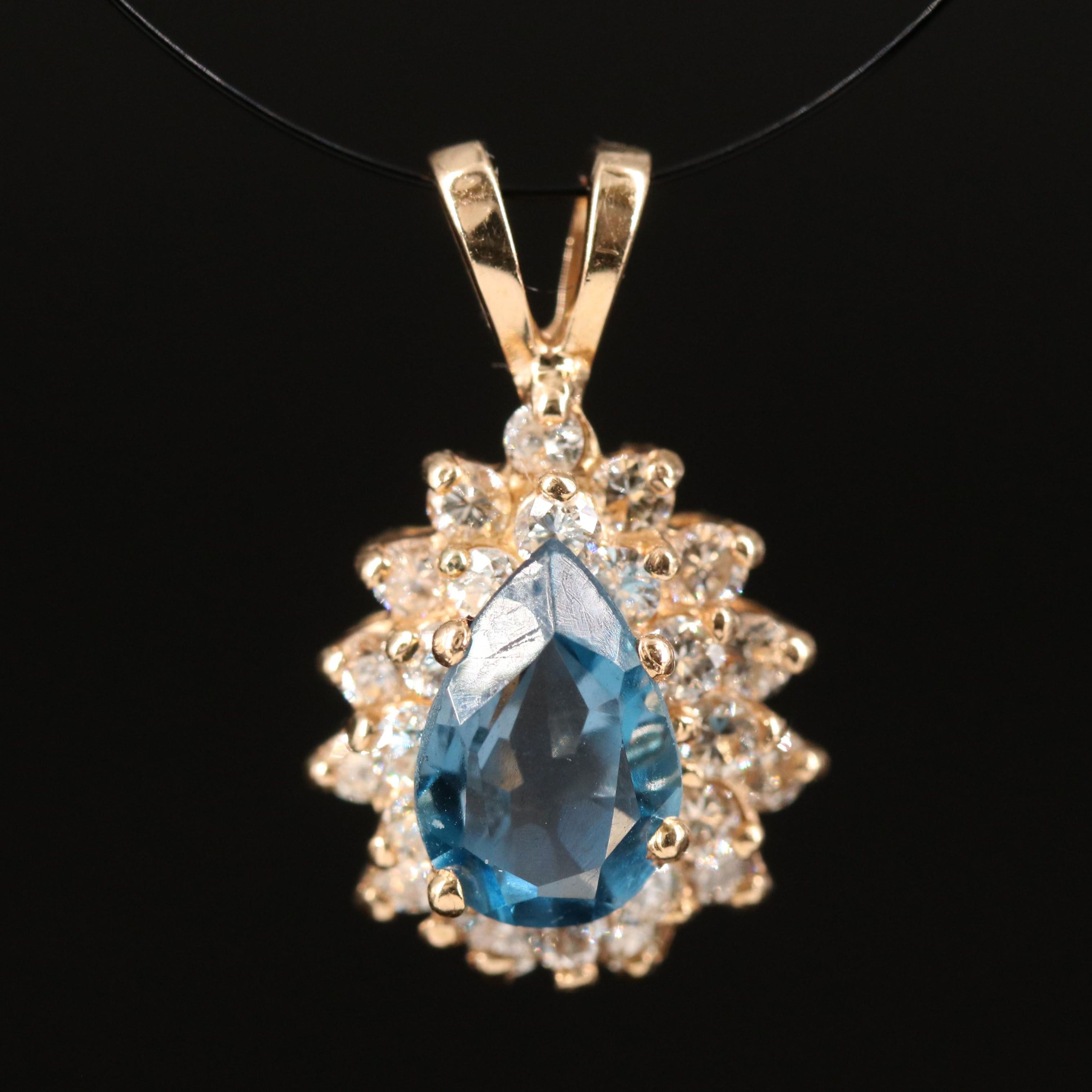 14K Swiss Blue Topaz and Diamond Pendant