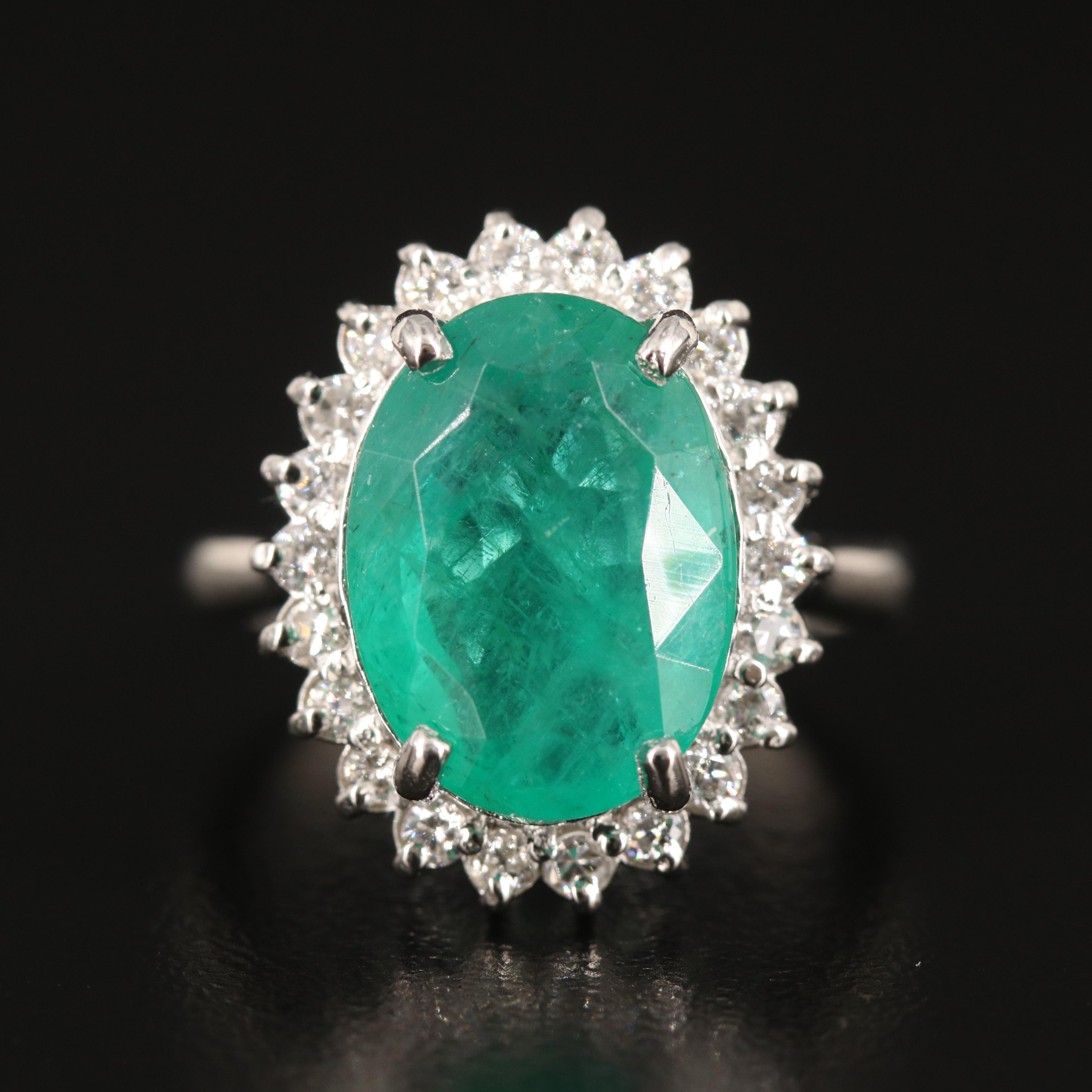 Platinum 6.31 CT Emerald and Diamond Ring with GIA Report