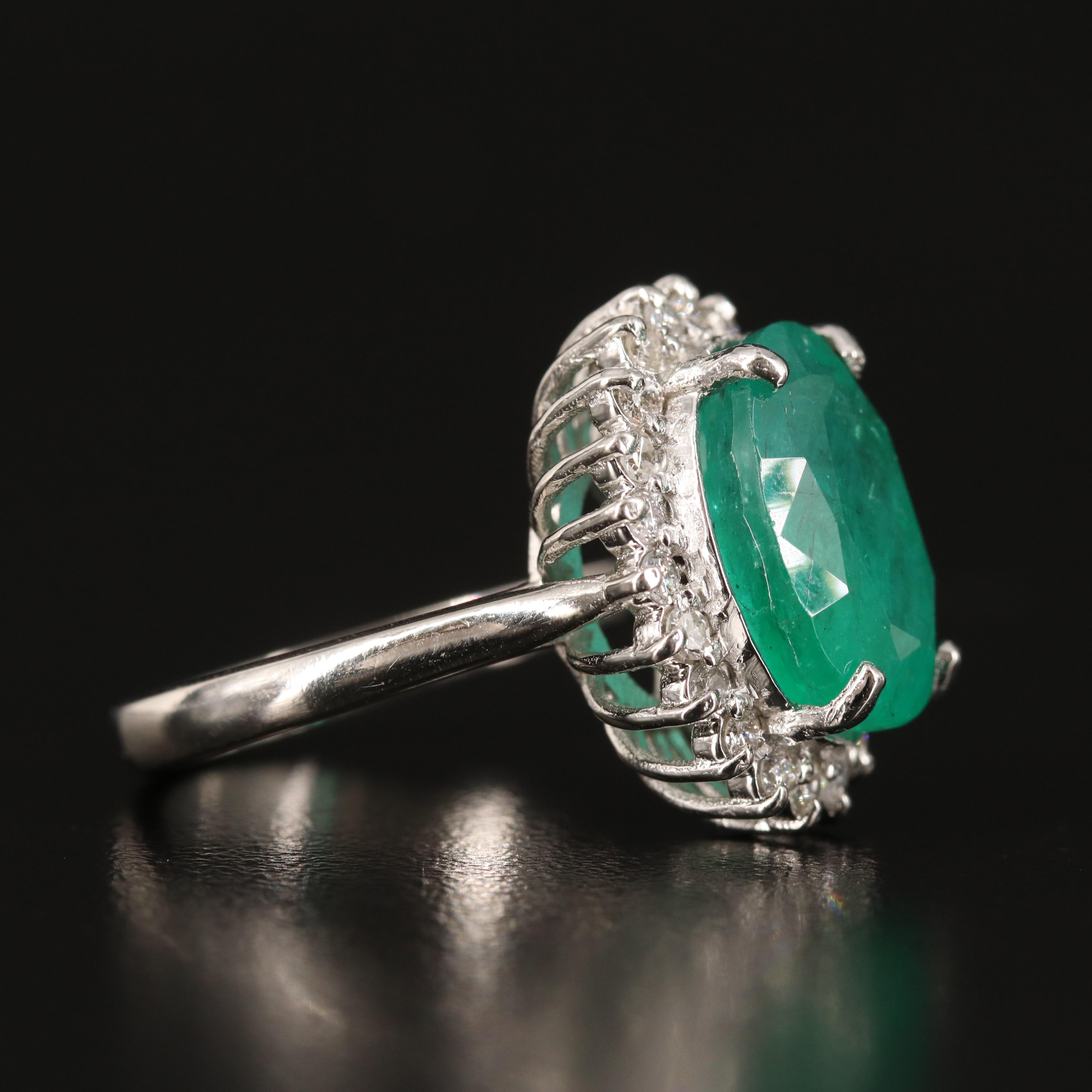 Platinum 6.31 CT Emerald and Diamond Ring with GIA Report