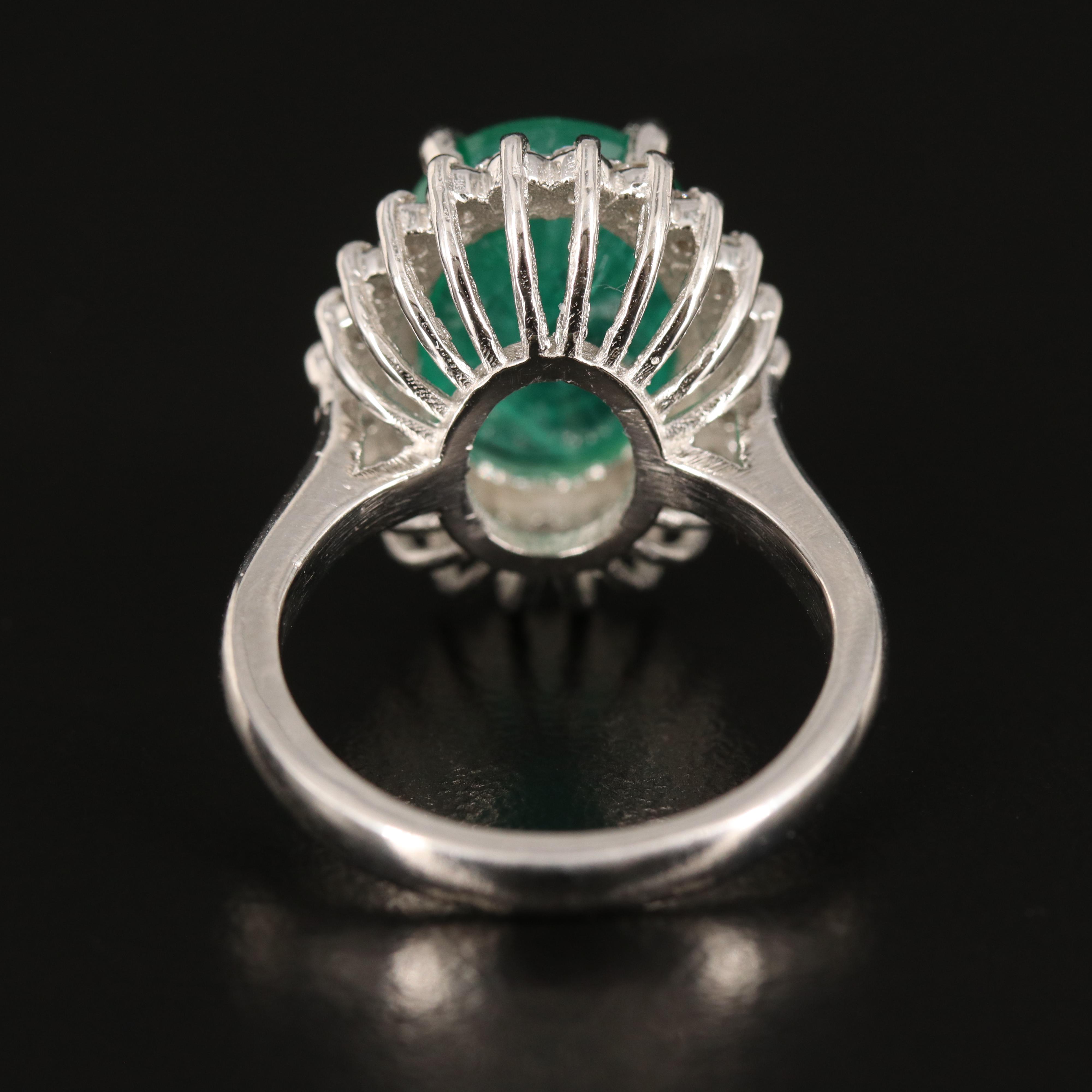 Platinum 6.31 CT Emerald and Diamond Ring with GIA Report