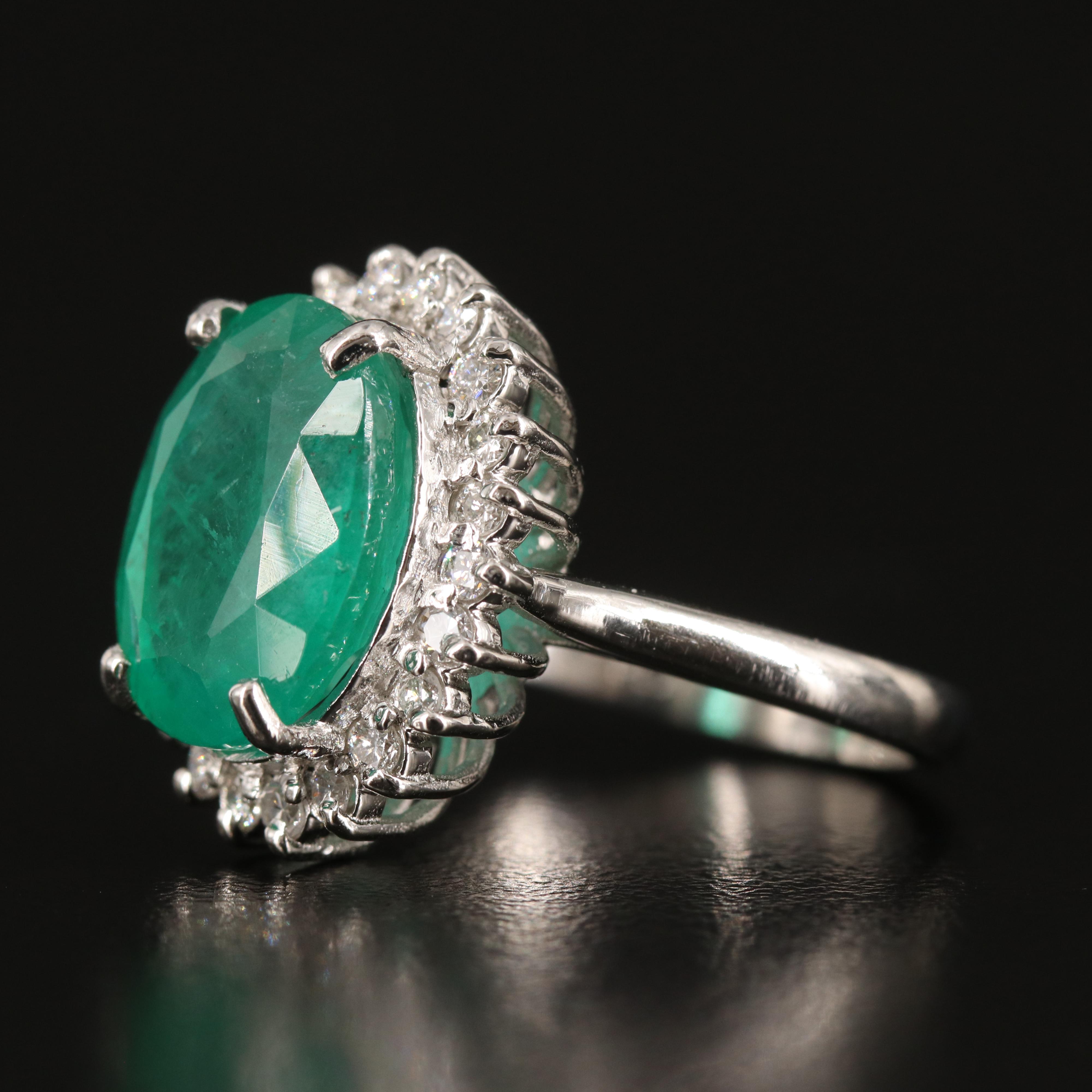 Platinum 6.31 CT Emerald and Diamond Ring with GIA Report