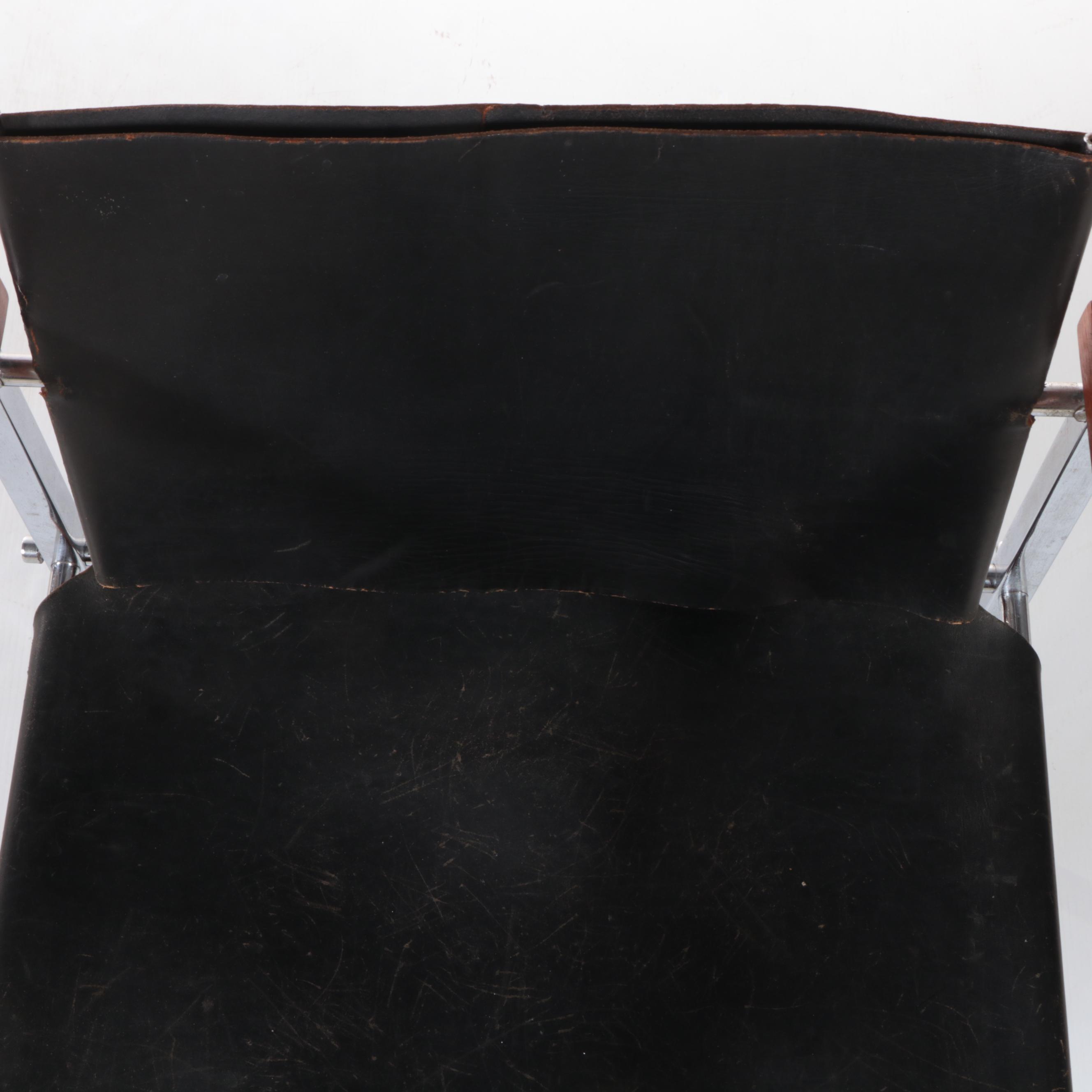 Pair of Modernist Chromed Steel, Leather Sling, and Walnut Armchairs