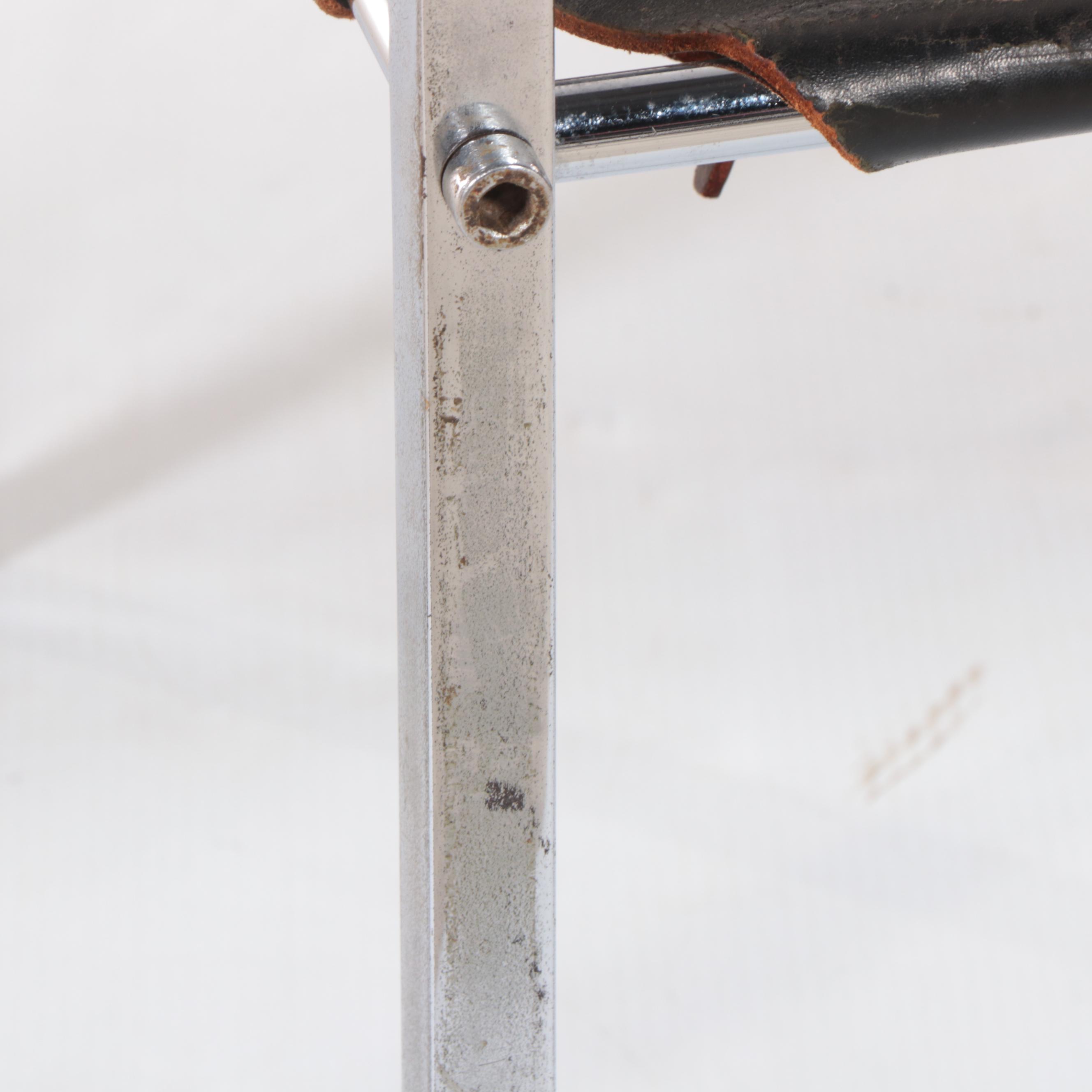 Pair of Modernist Chromed Steel, Leather Sling, and Walnut Armchairs