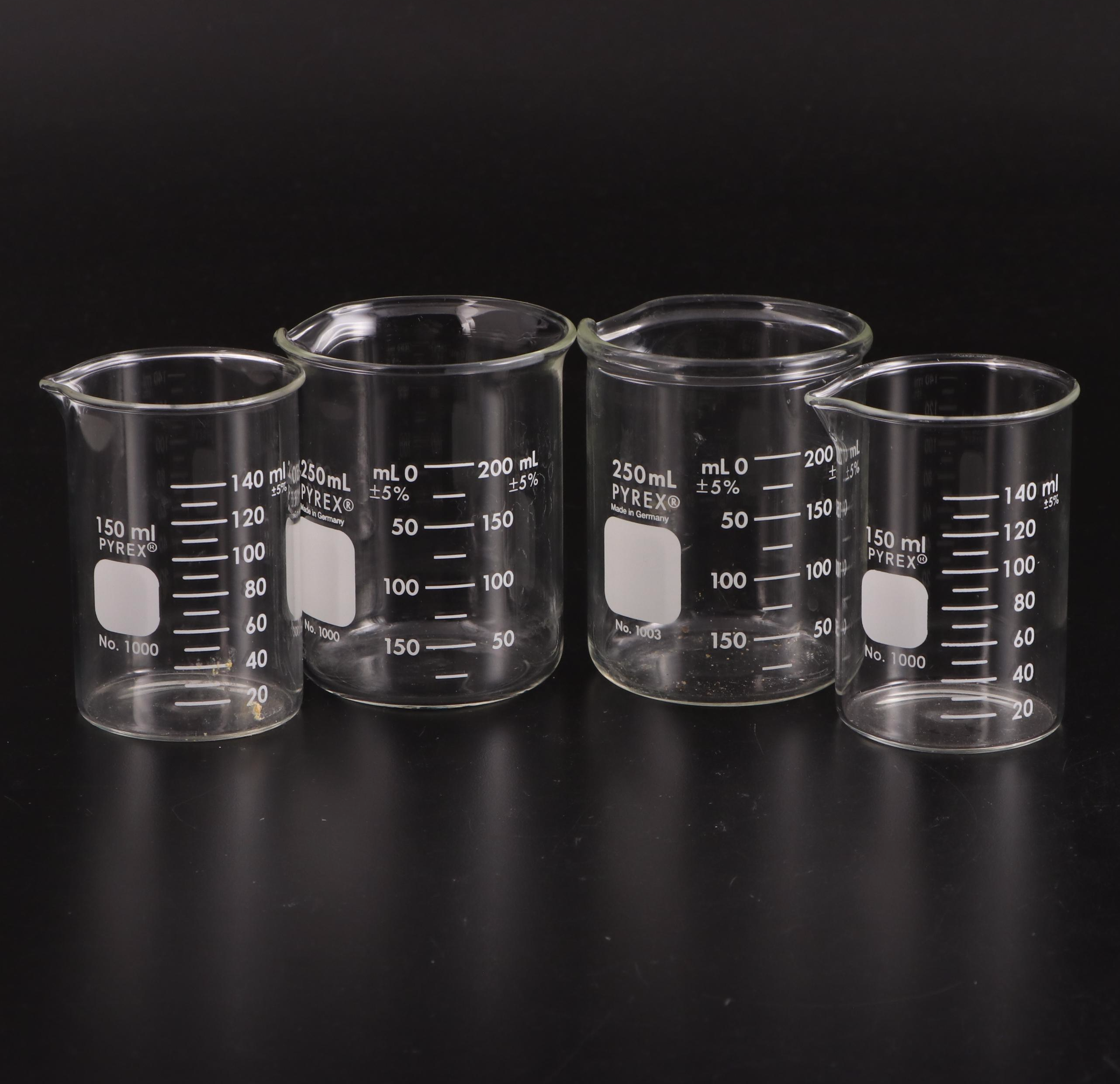 Pyrex Laboratory Glass No. 1000 and No. 1003 Beakers with Funnels
