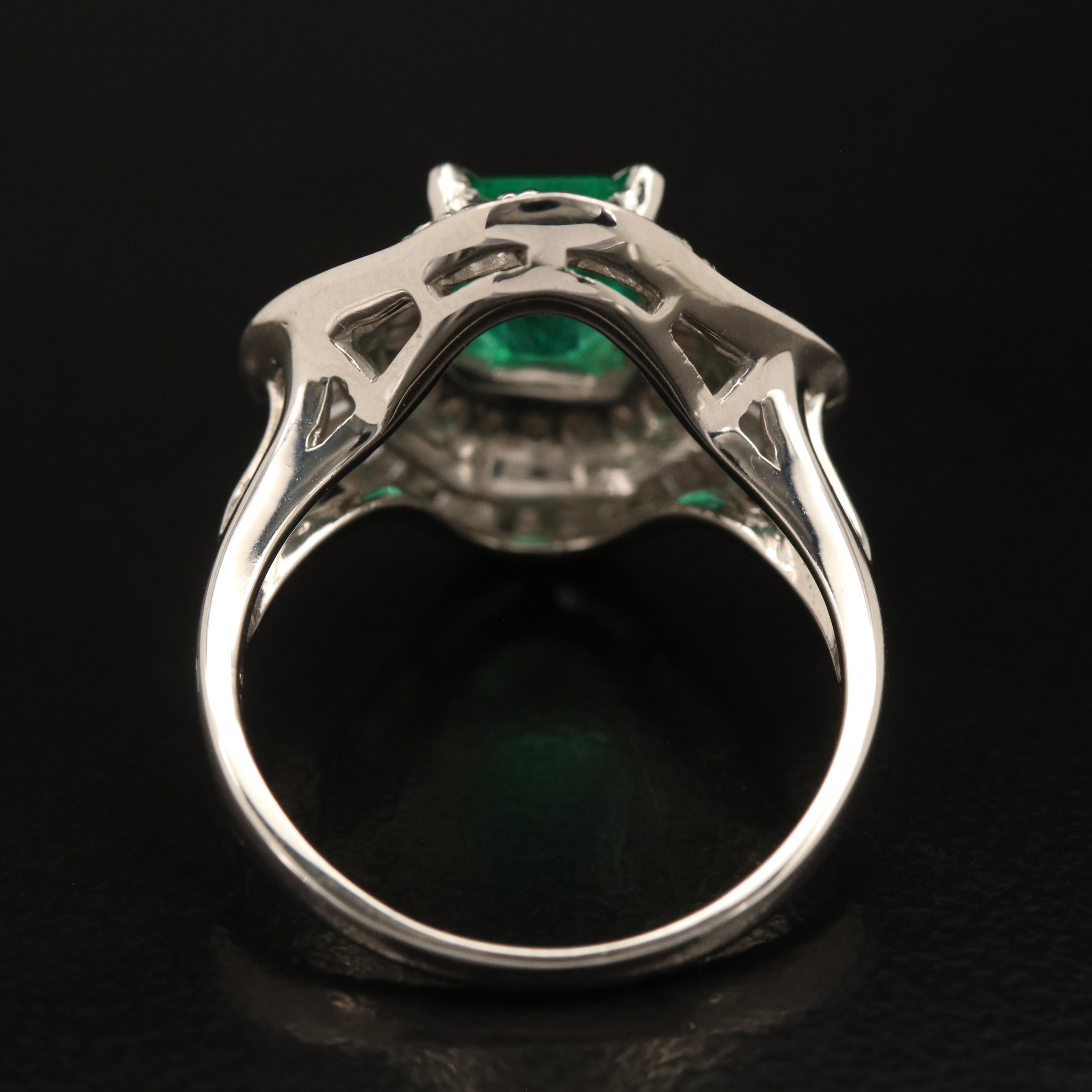 Platinum 1.68 CT Emerald and 1.00 CTW Diamond Ring