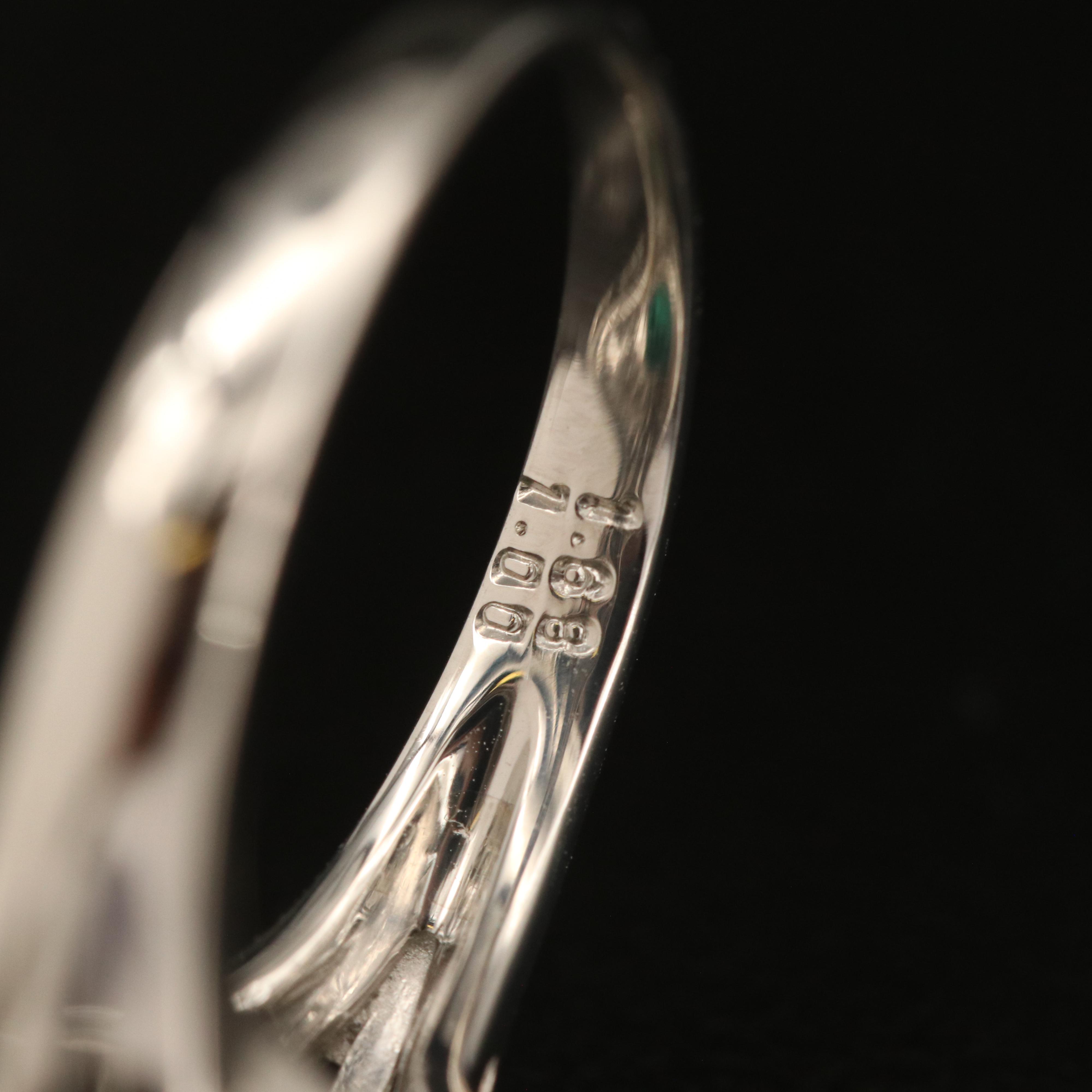 Platinum 1.68 CT Emerald and 1.00 CTW Diamond Ring