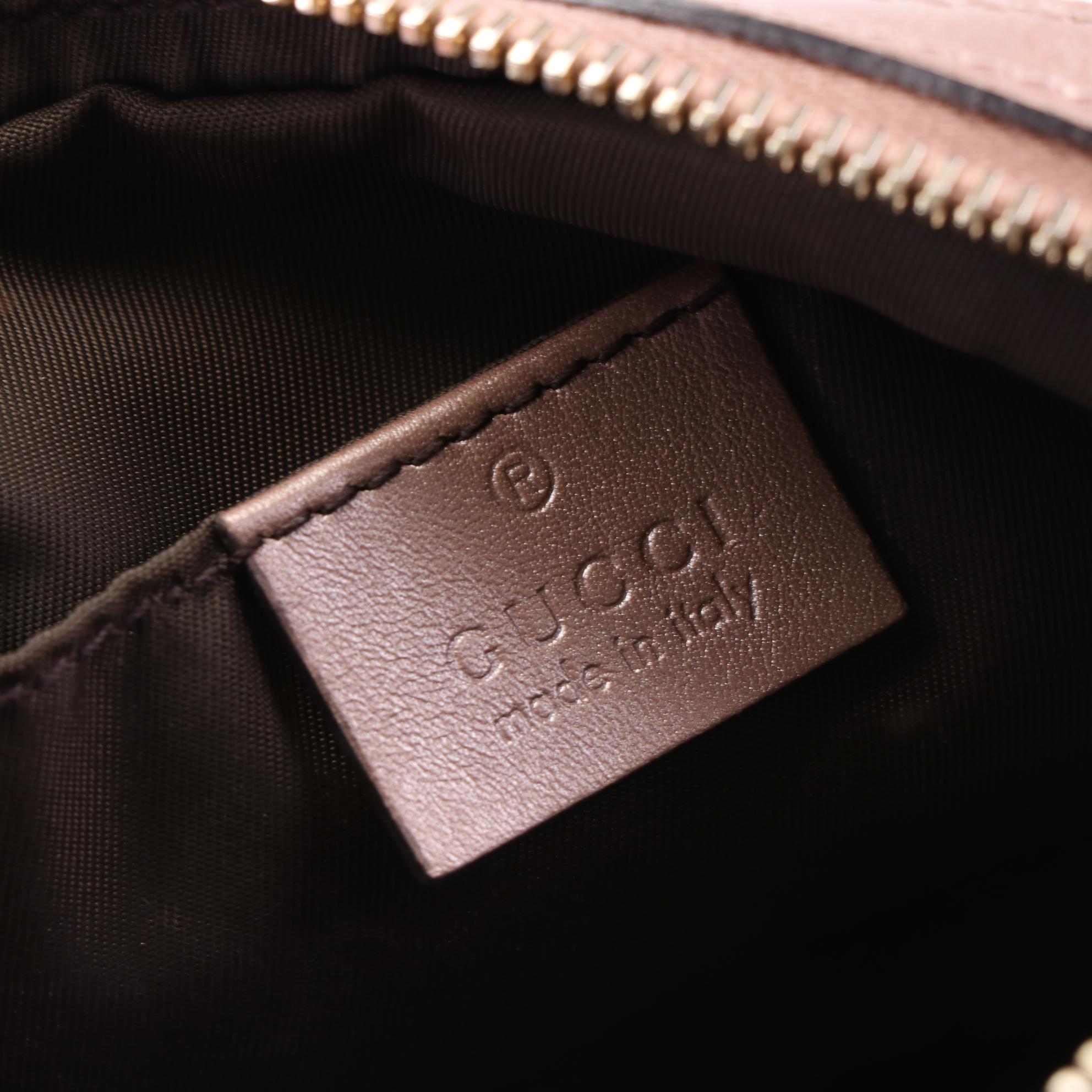 Gucci Interlocking GG Cosmetic Pouch in Microguccissima Leather with Box