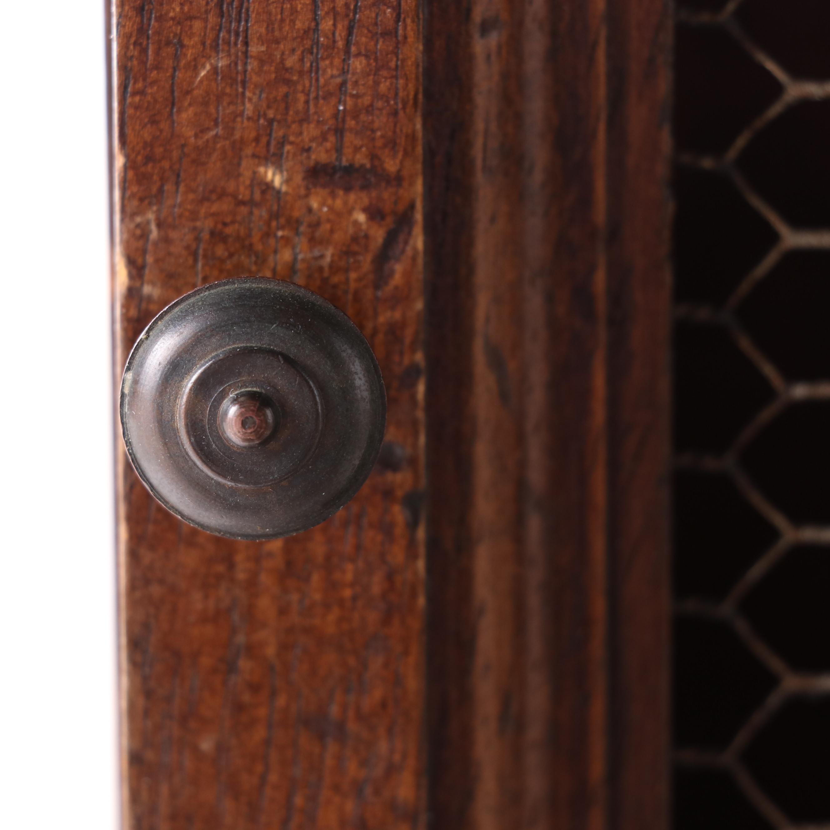 Small Neoclassical Style Walnut-Stained and Wire Mesh Cabinet