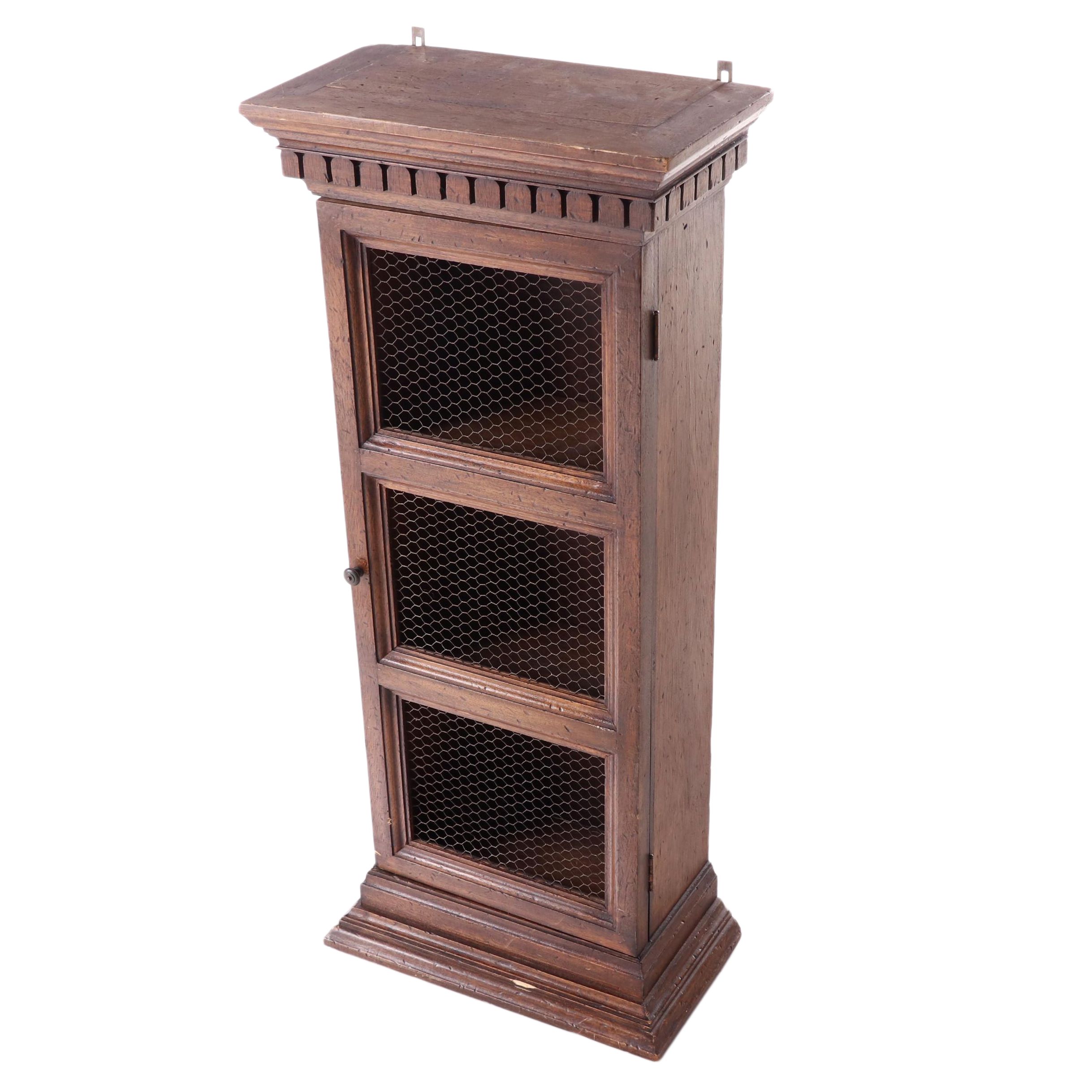 Small Neoclassical Style Walnut-Stained and Wire Mesh Cabinet