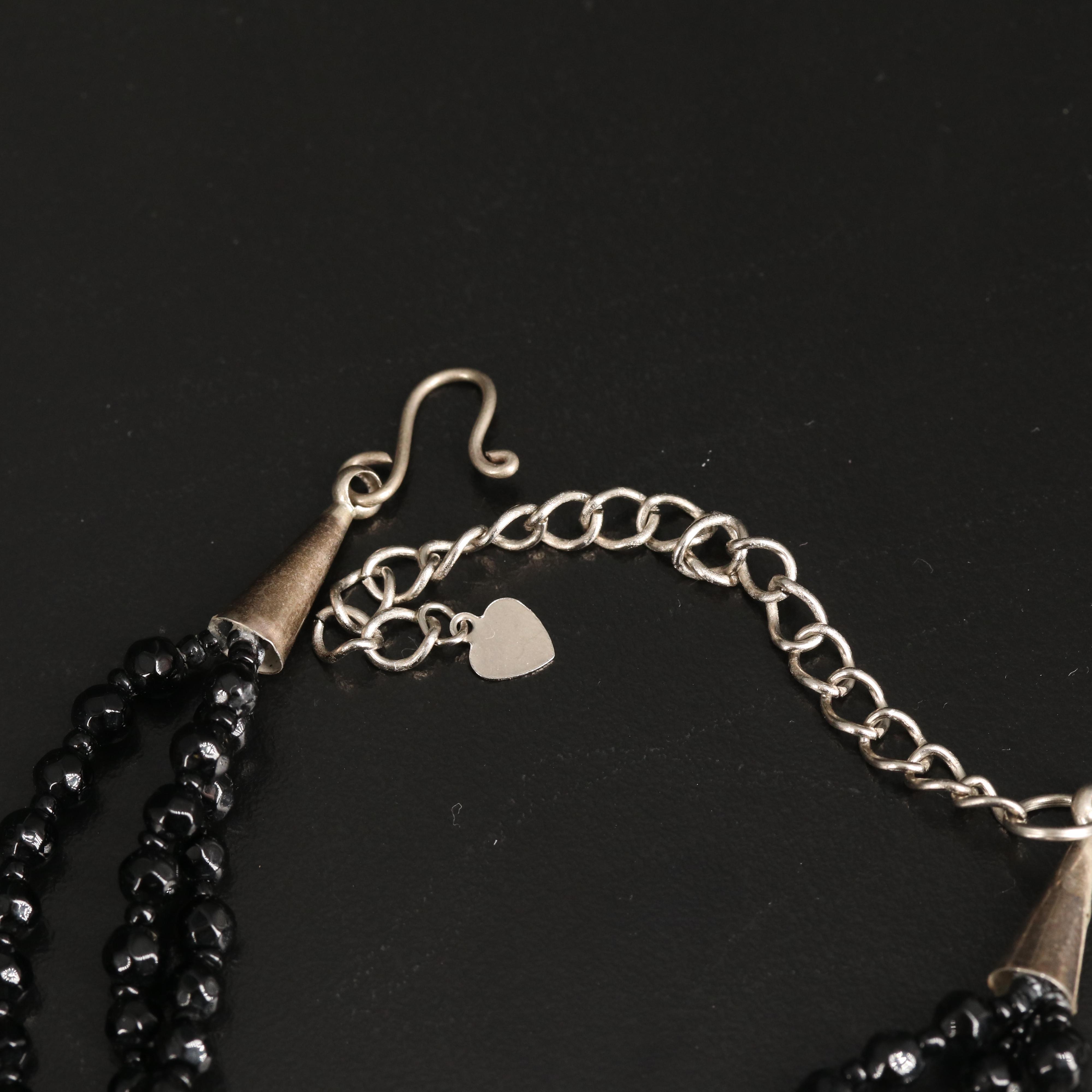 Pearl, Sagenitic Quartz and Mother-of-Pearl Featured in Floral Necklaces