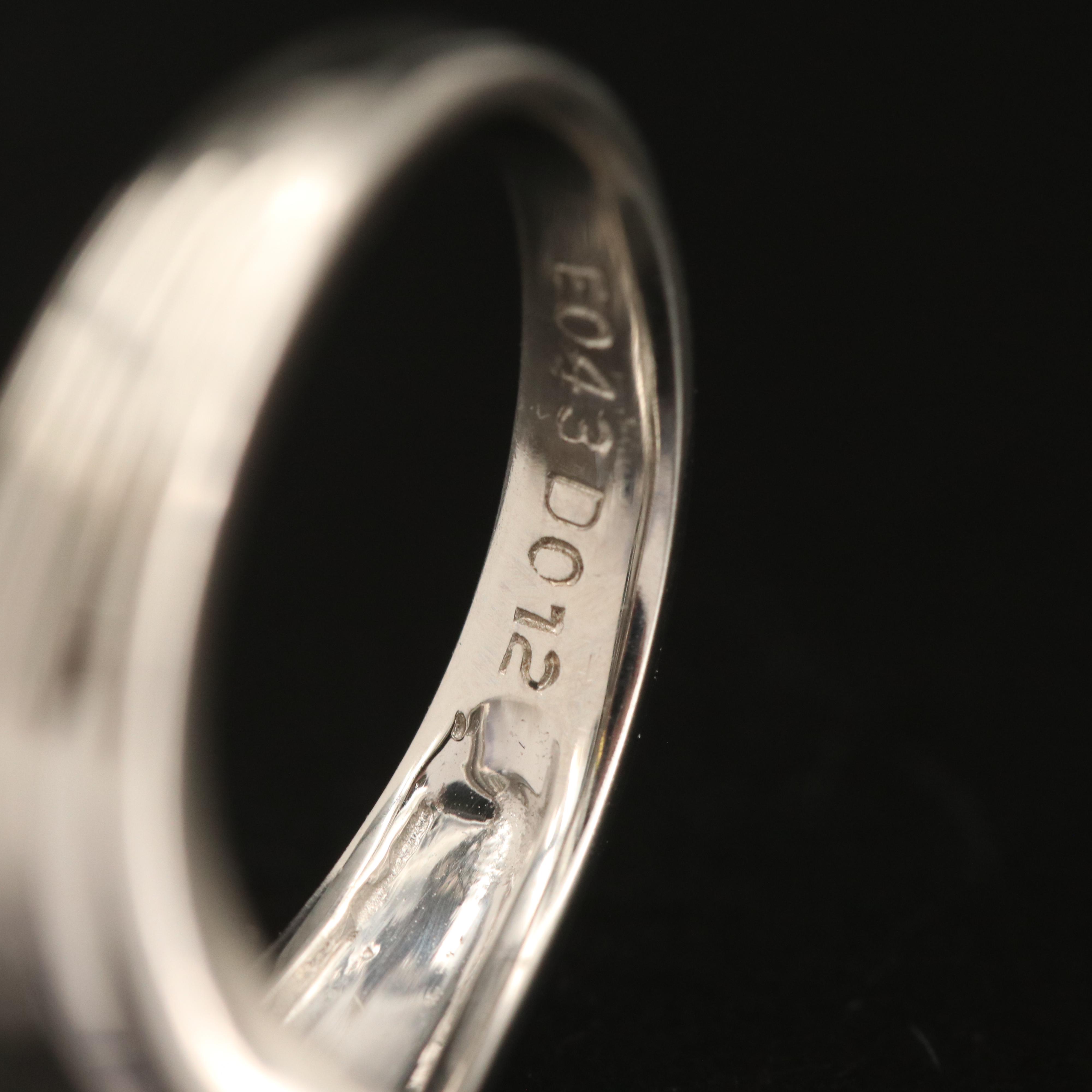 Platinum Emerald and Diamond Ring