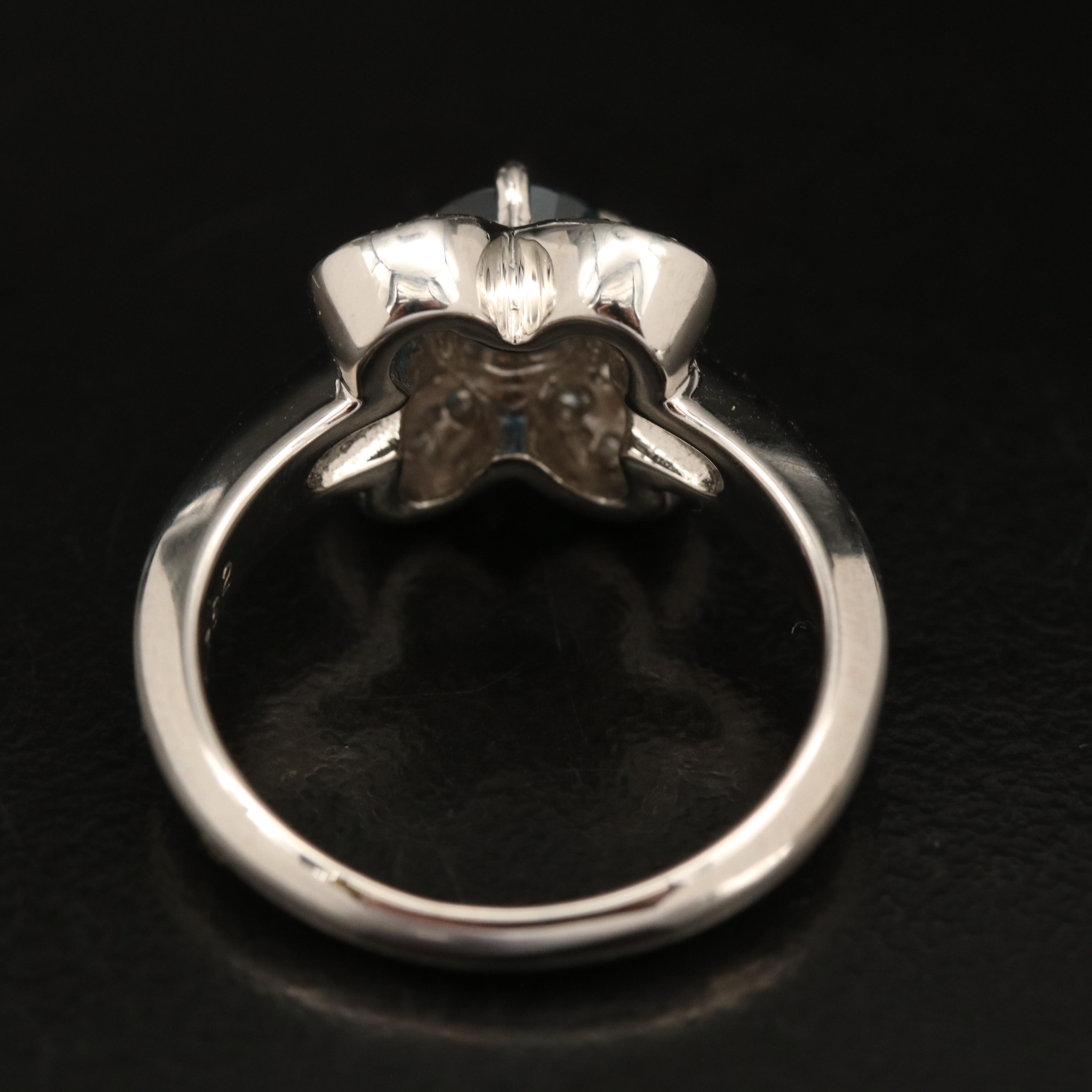 Platinum Sapphire and Diamond Flower Ring