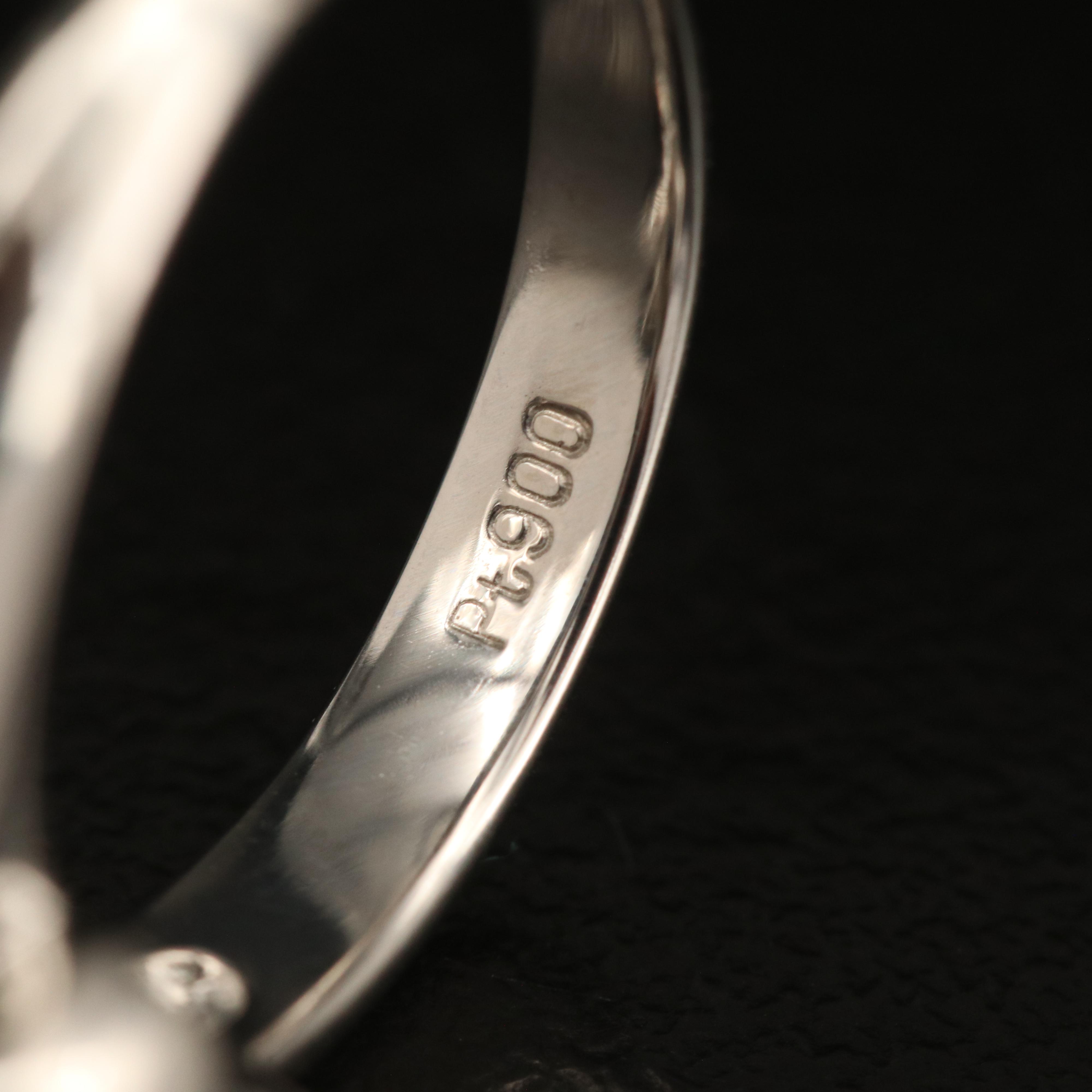 Platinum Sapphire and Diamond Flower Ring