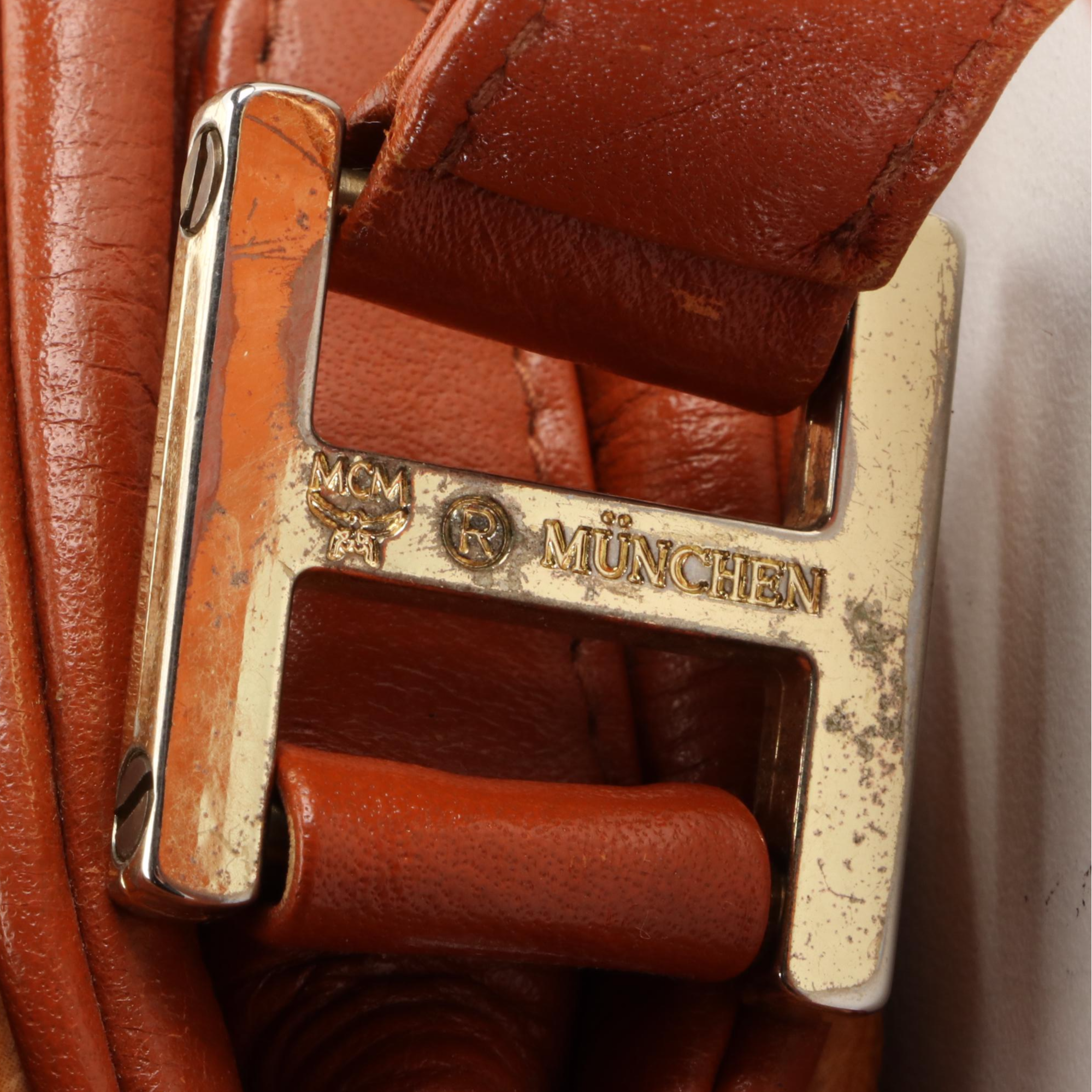 MCM Accordion-Style Crossbody Bag in Cognac Monogram Visetos and Leather