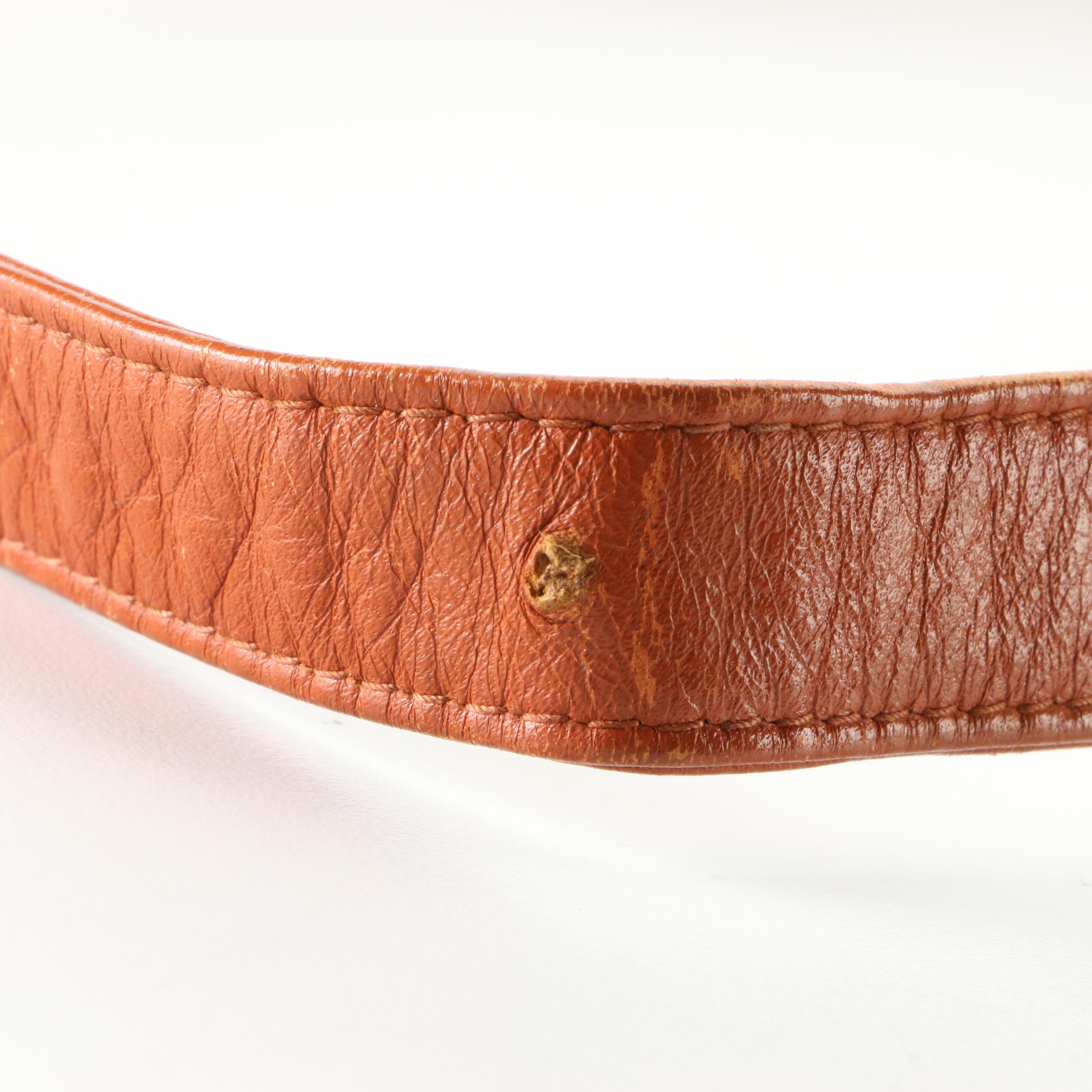 MCM Accordion-Style Crossbody Bag in Cognac Monogram Visetos and Leather