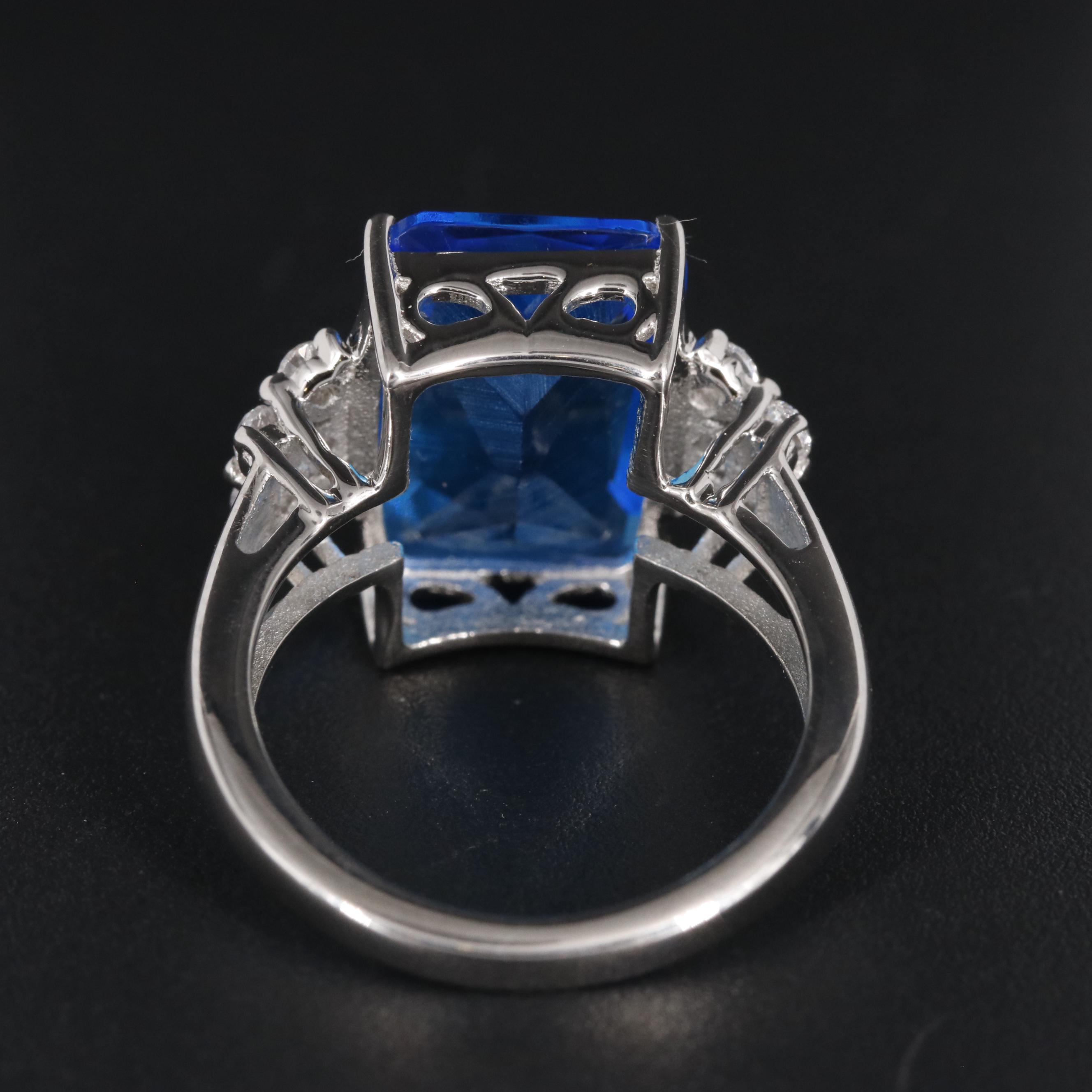 Sterling Blue Topaz with Cubic Zirconia Ring