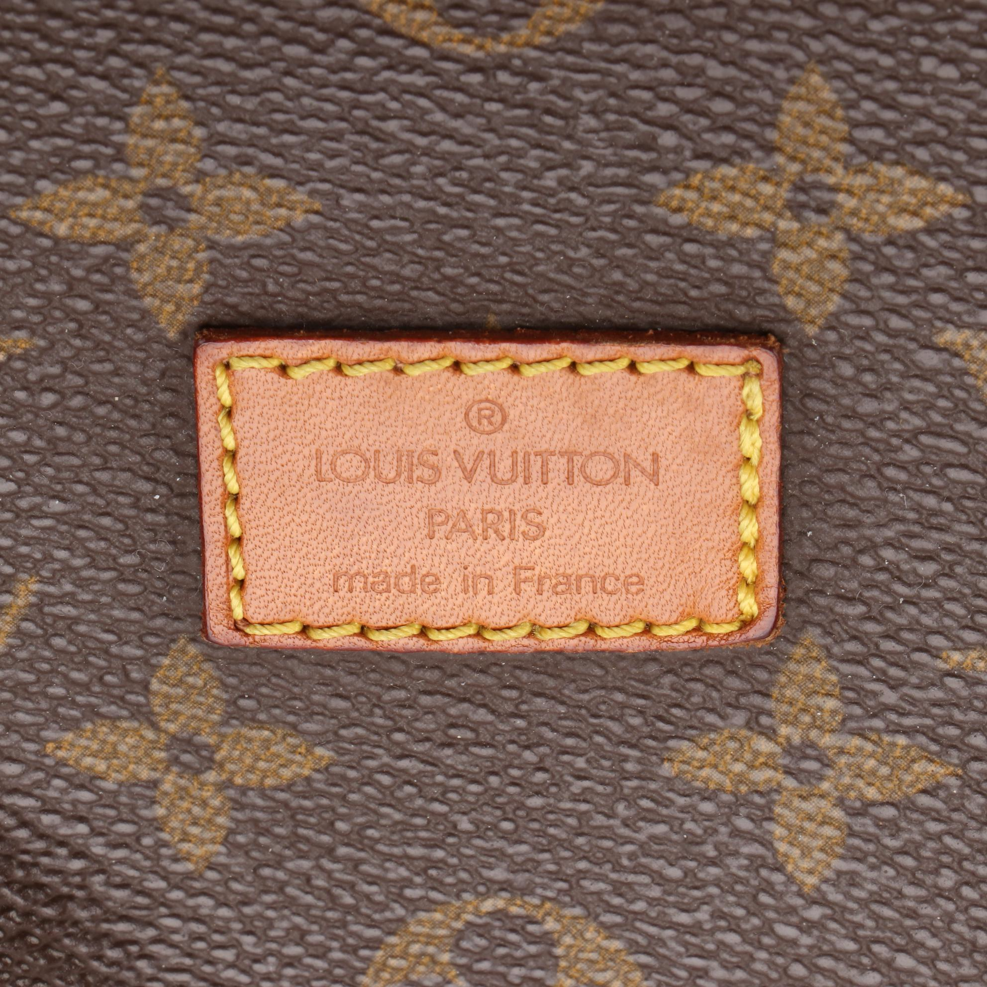 Louis Vuitton Saumur 35 Bag in Monogram Canvas and Vachetta Leather