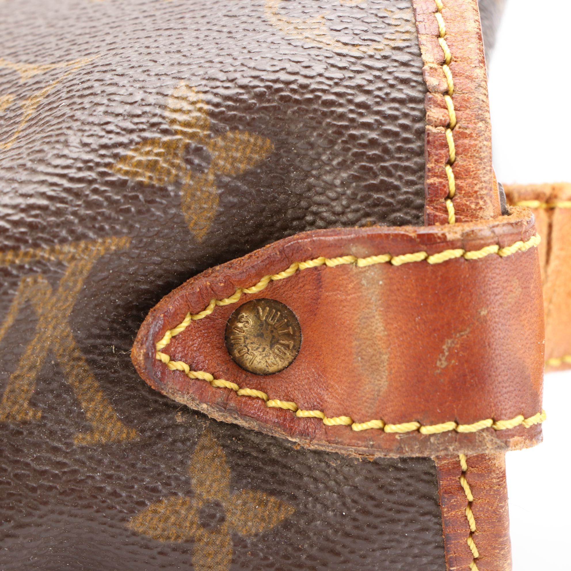 Louis Vuitton Saumur 35 Bag in Monogram Canvas and Vachetta Leather