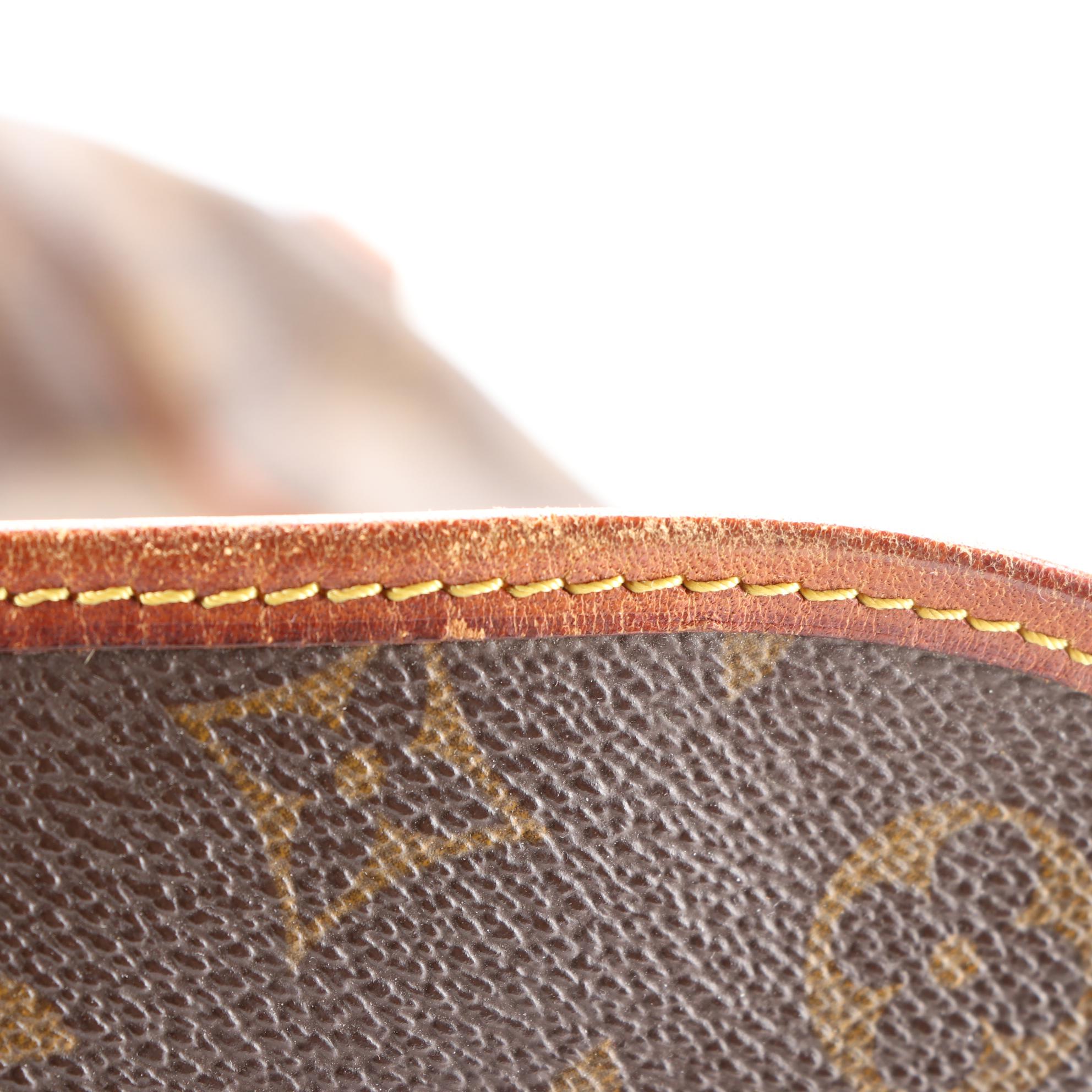 Louis Vuitton Saumur 35 Bag in Monogram Canvas and Vachetta Leather