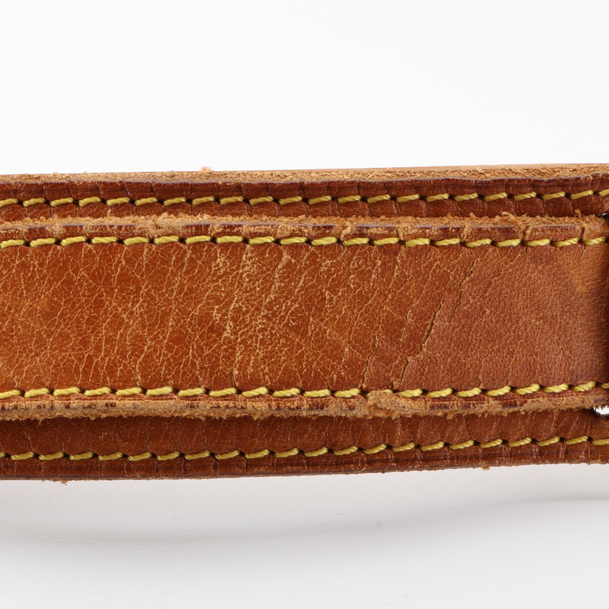 Louis Vuitton Saumur 35 Bag in Monogram Canvas and Vachetta Leather