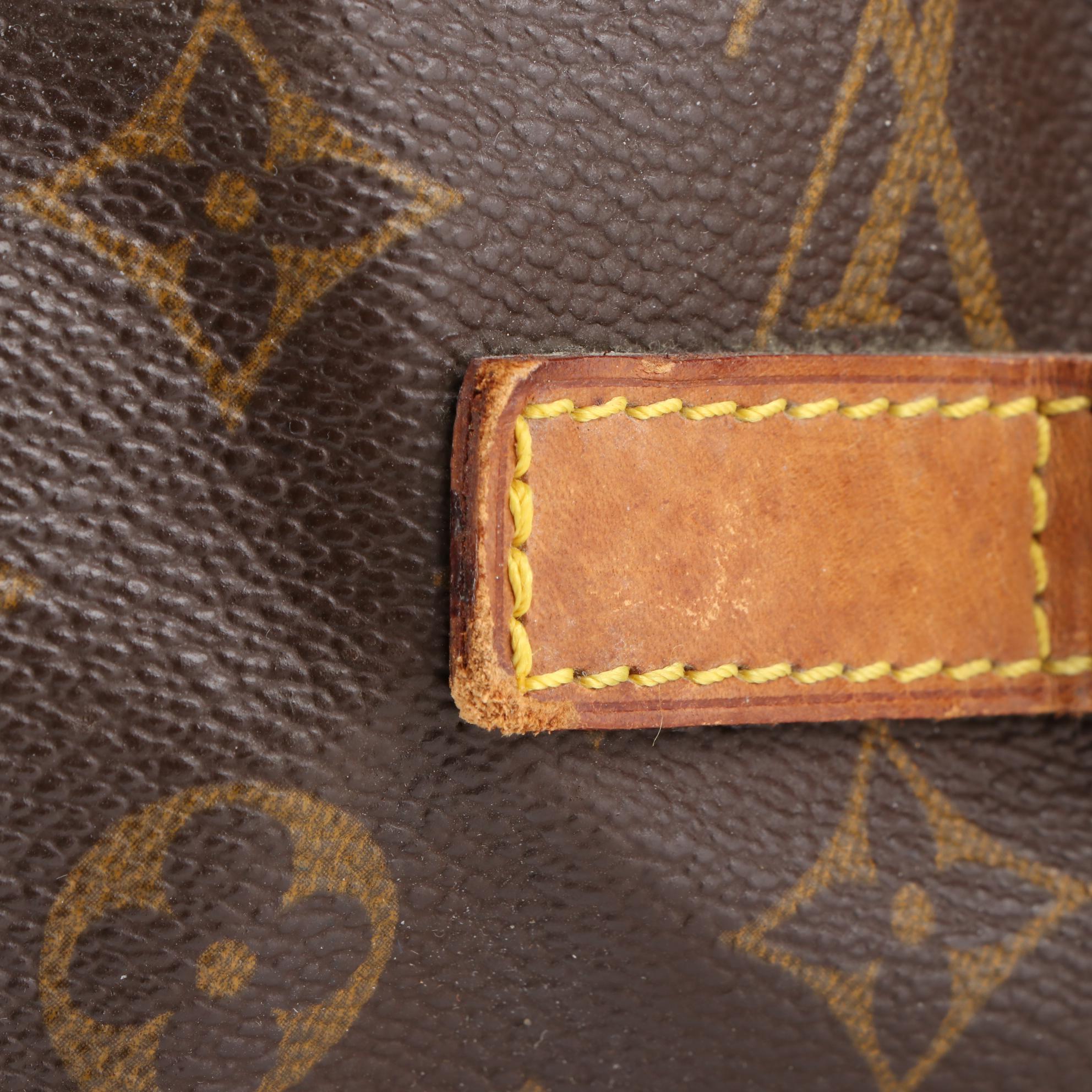 Louis Vuitton Saumur 35 Bag in Monogram Canvas and Vachetta Leather