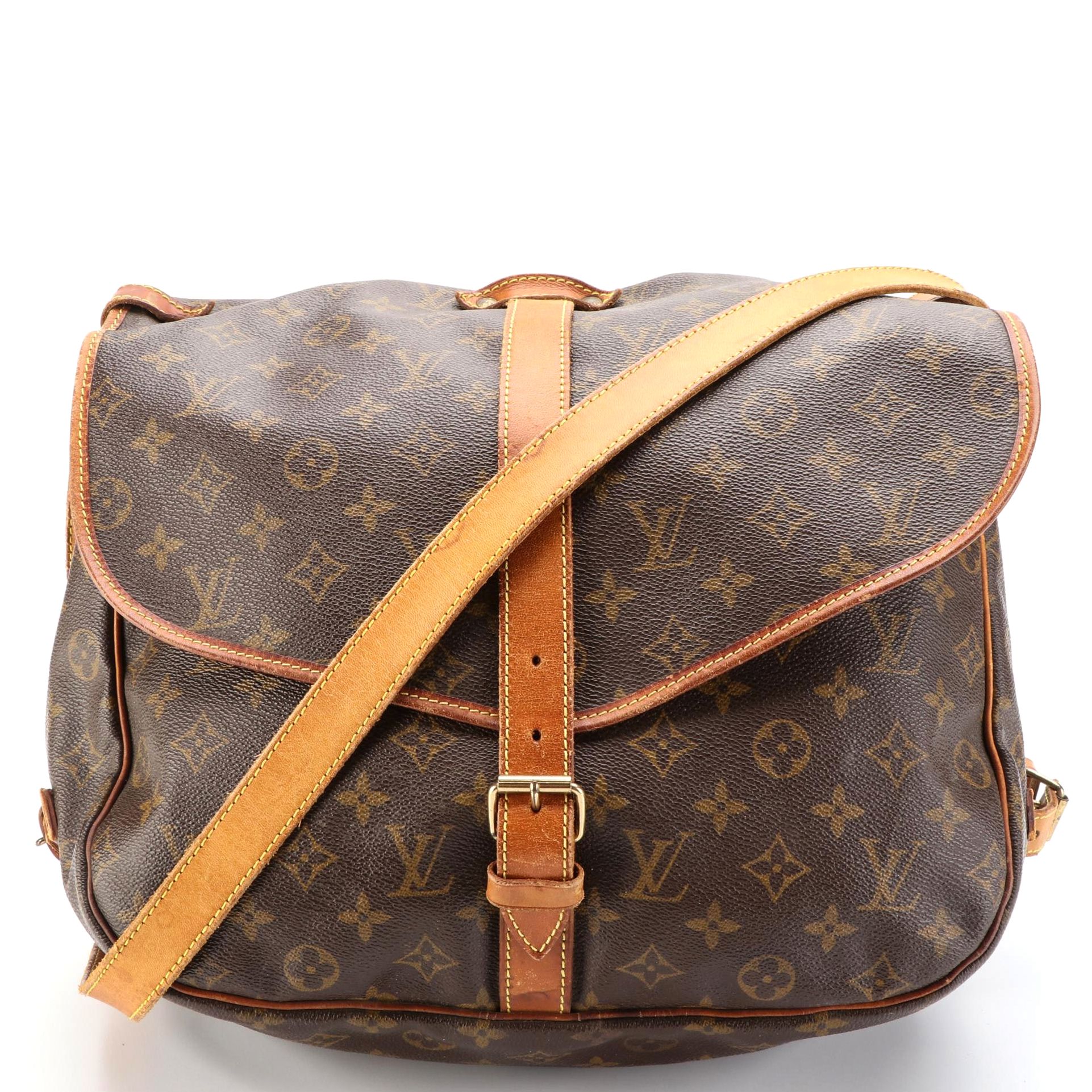 Louis Vuitton Saumur 35 Bag in Monogram Canvas and Vachetta Leather