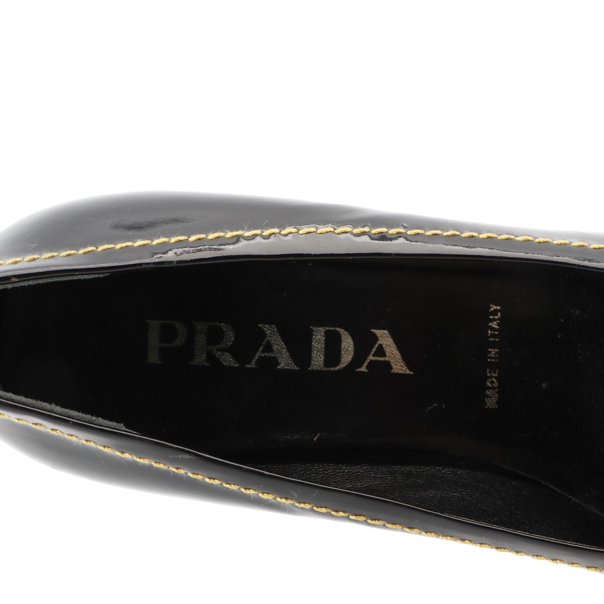 Prada Patent Leather Penny Loafers with Contrast Stitching and Tapered Heel