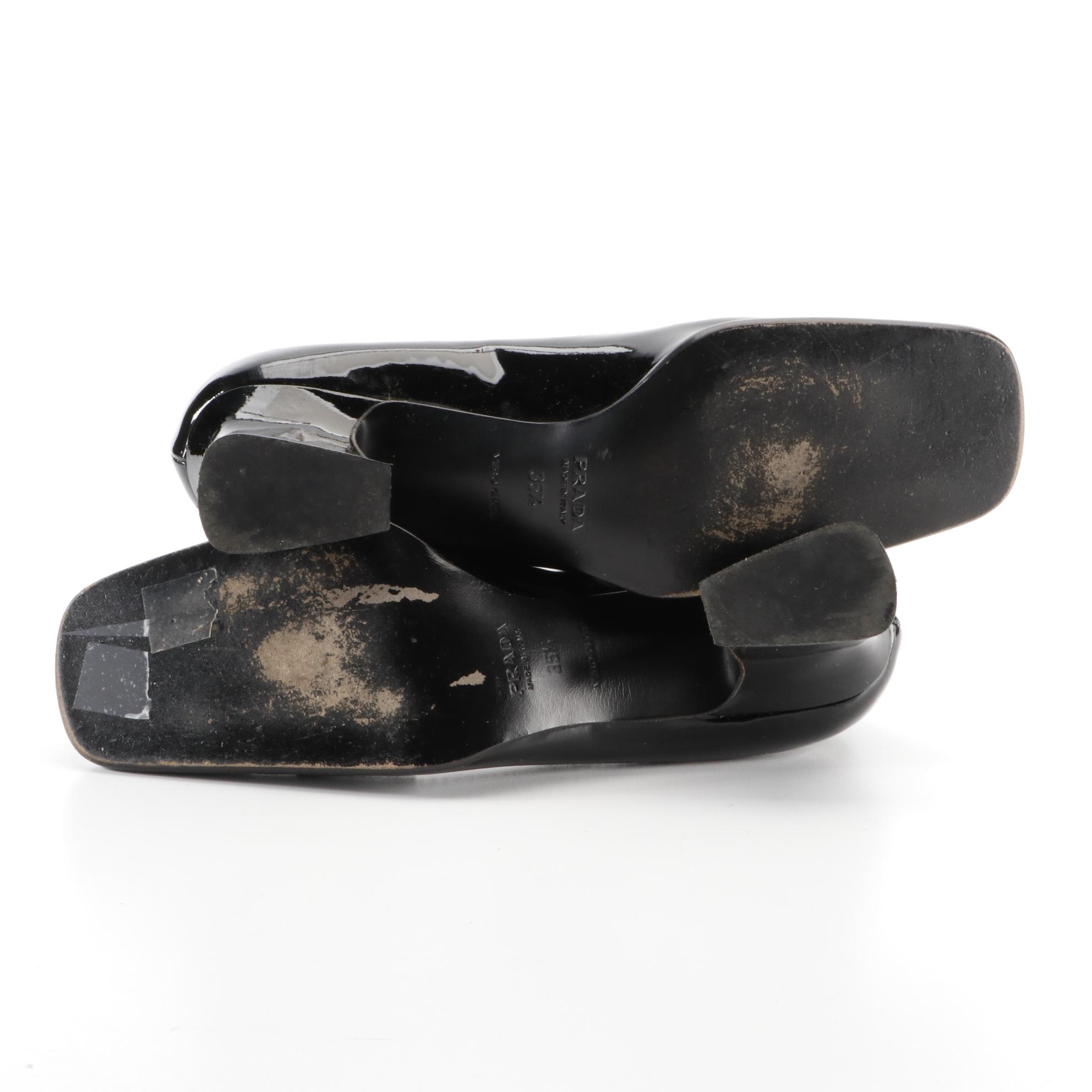 Prada Patent Leather Penny Loafers with Contrast Stitching and Tapered Heel