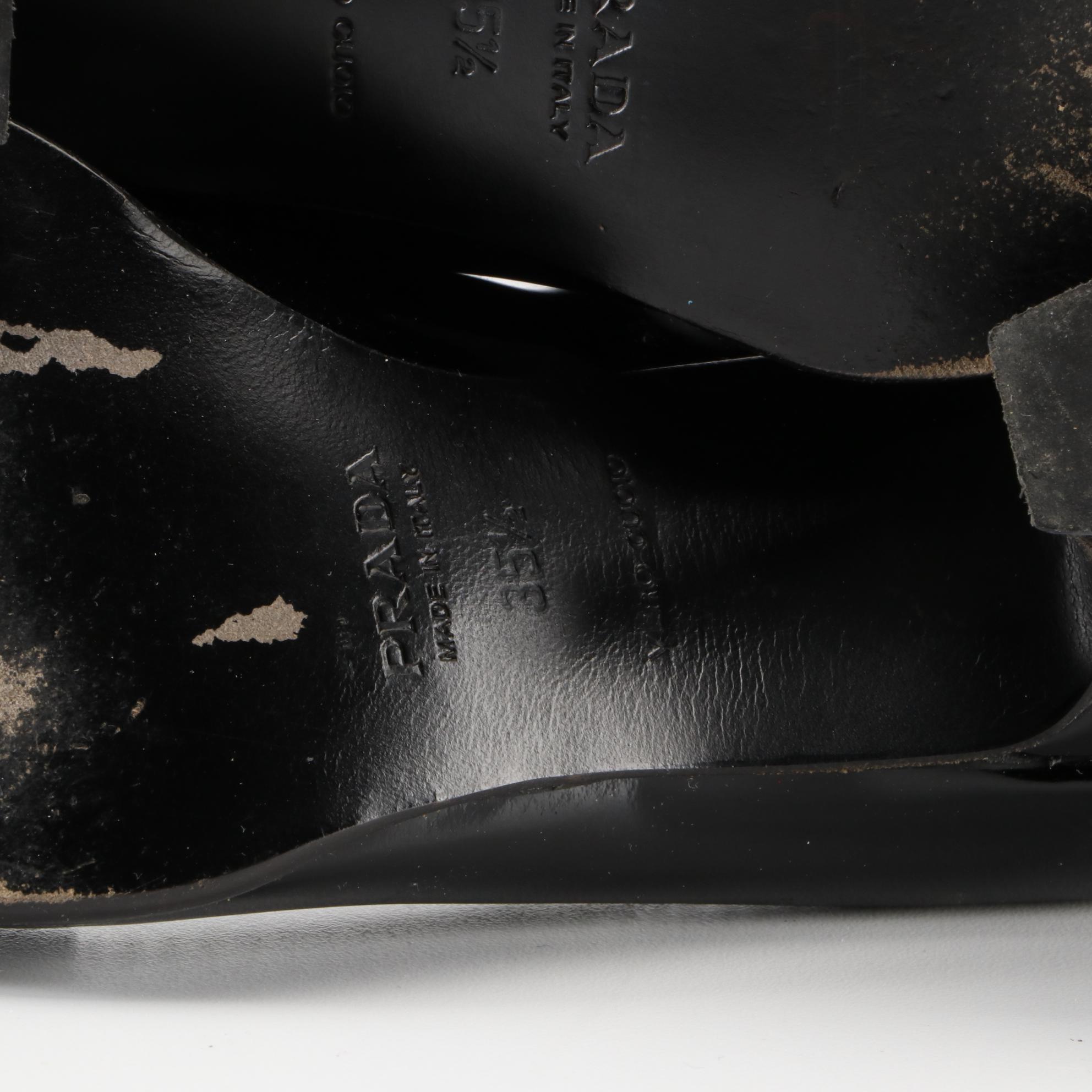 Prada Patent Leather Penny Loafers with Contrast Stitching and Tapered Heel