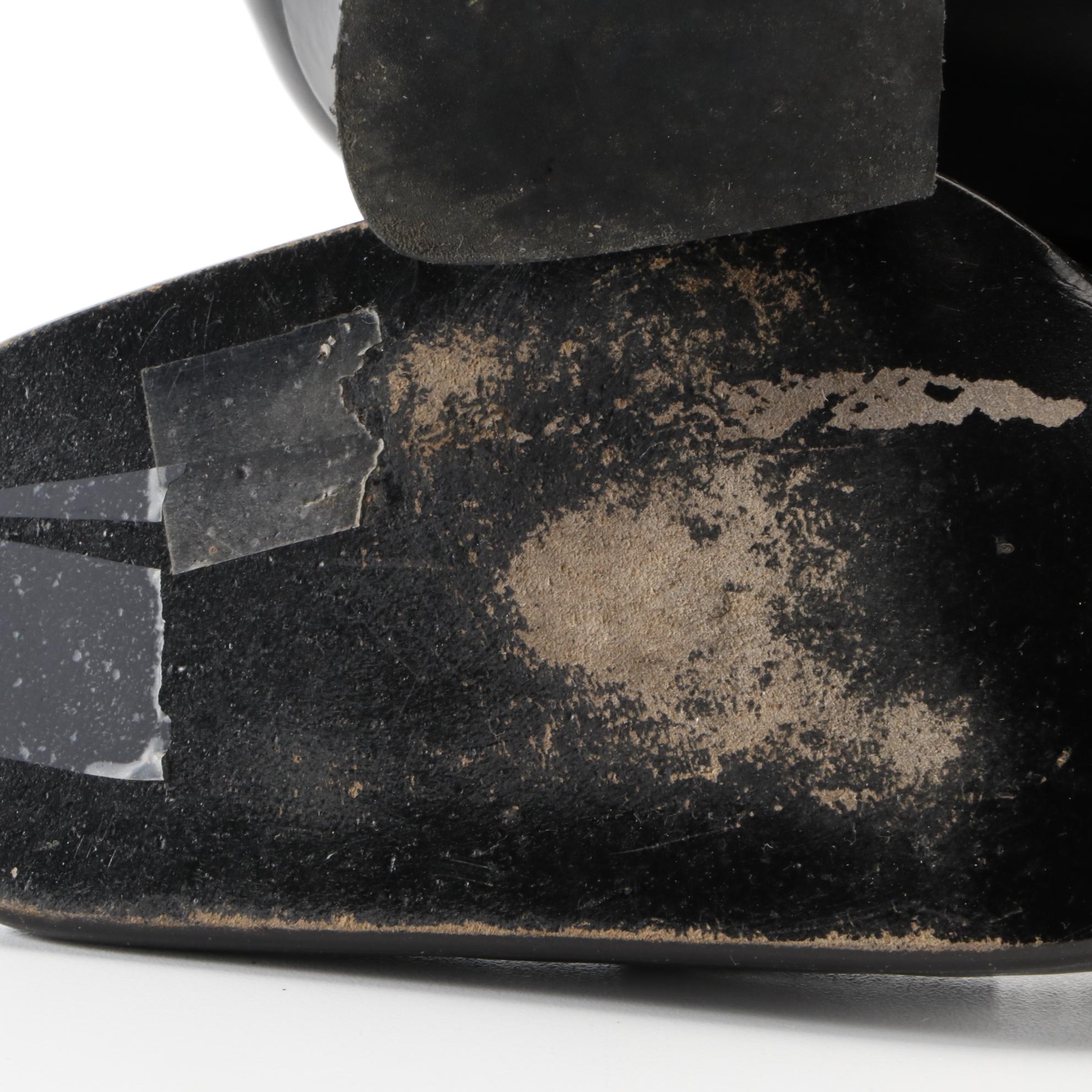 Prada Patent Leather Penny Loafers with Contrast Stitching and Tapered Heel