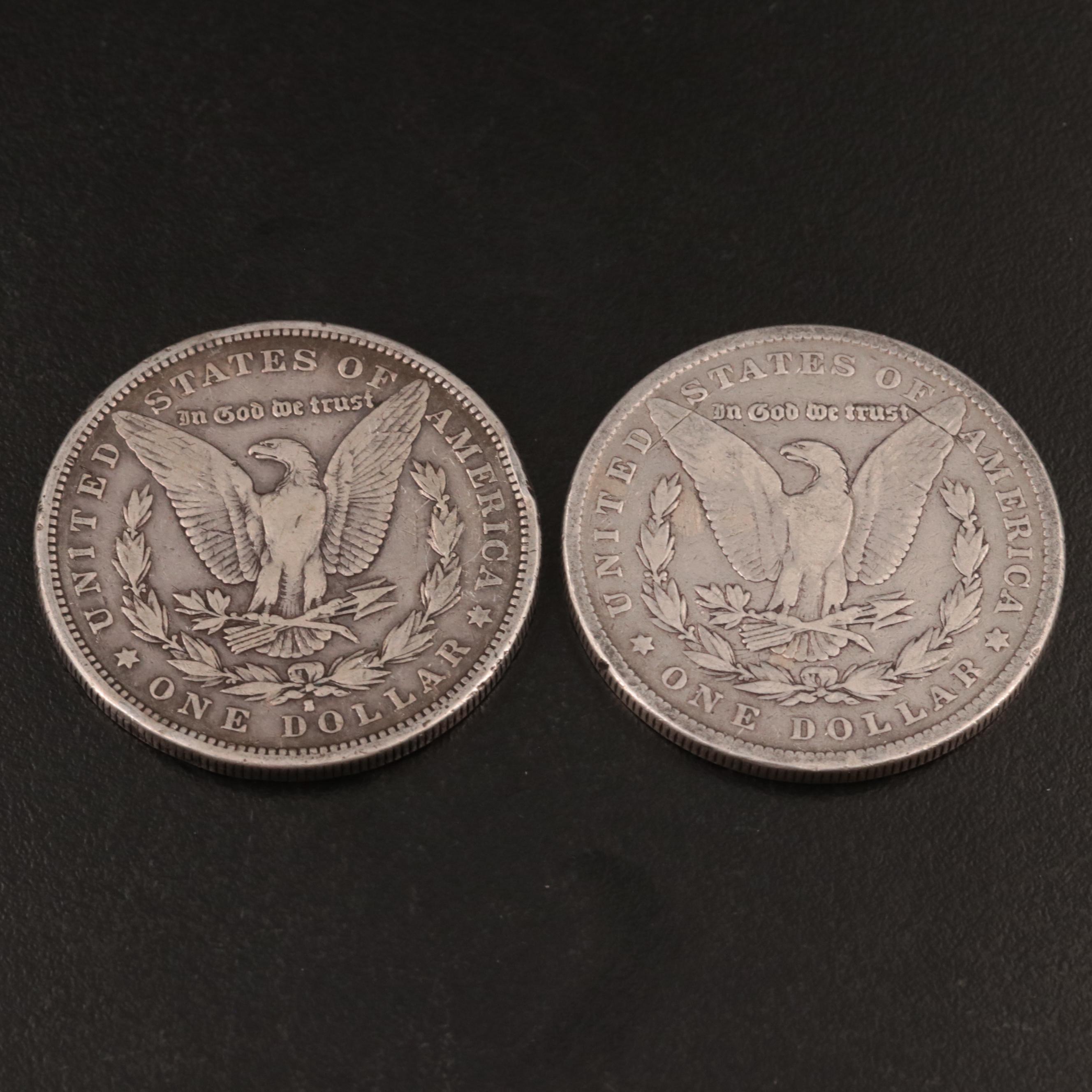 Two Morgan Silver Dollars Including 1879