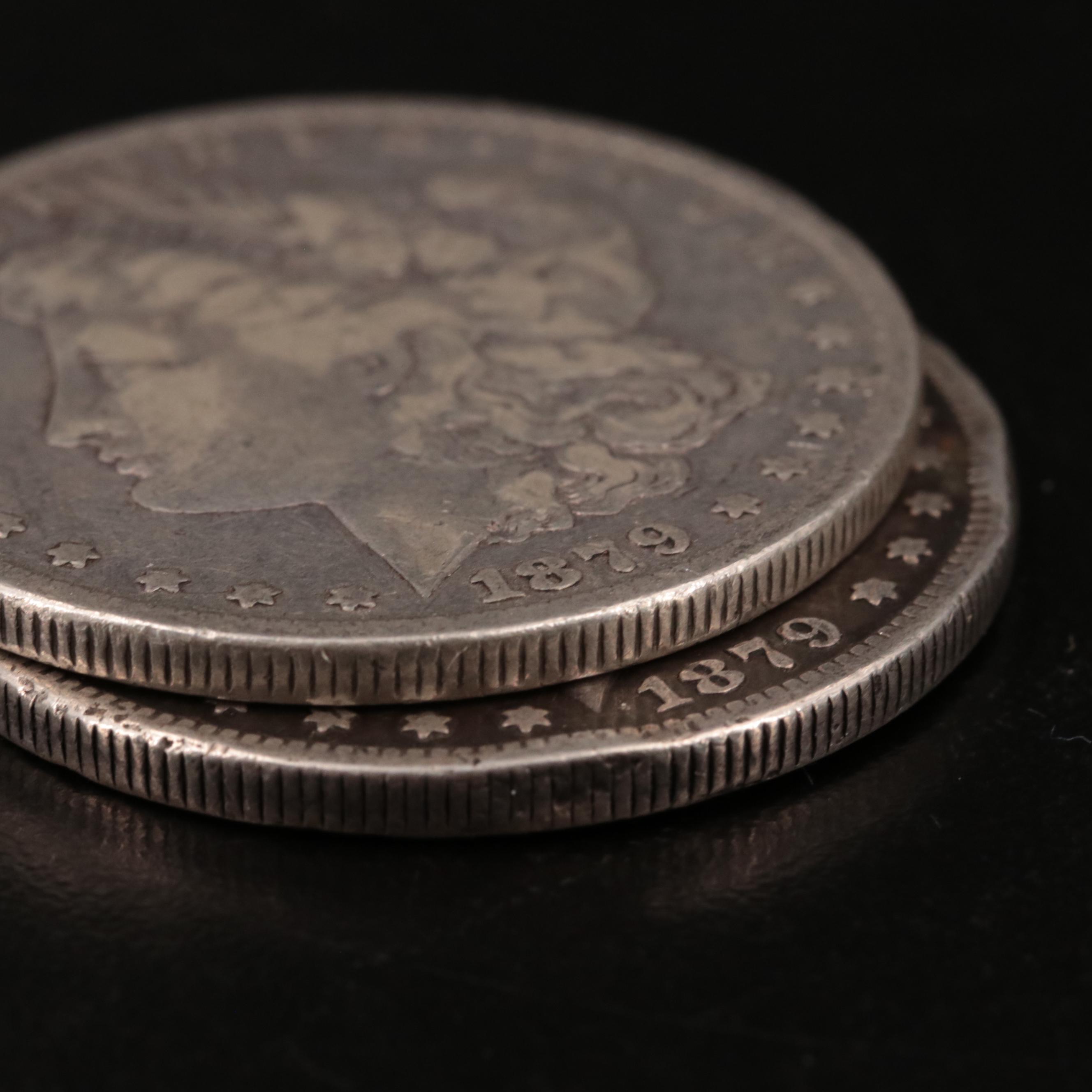 Two Morgan Silver Dollars Including 1879