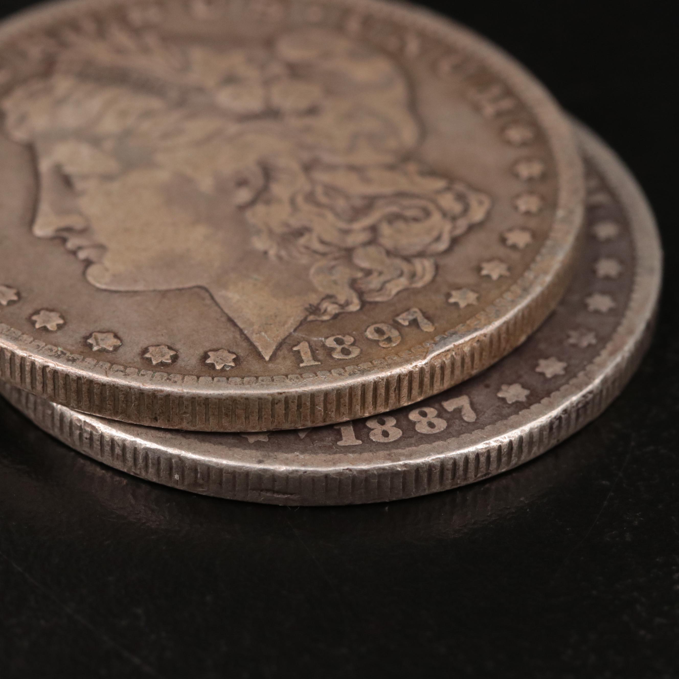 Two Morgan Silver Dollars Including 1887-O