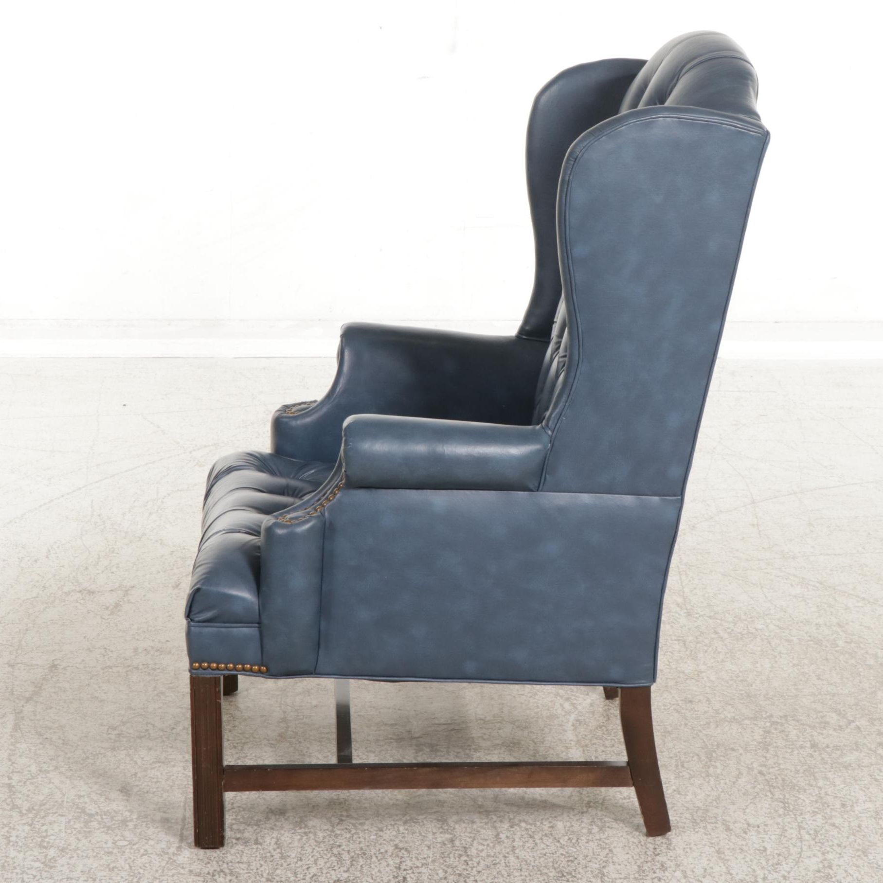 George III Style Faux Leather Upholstered Wing Back Armchair