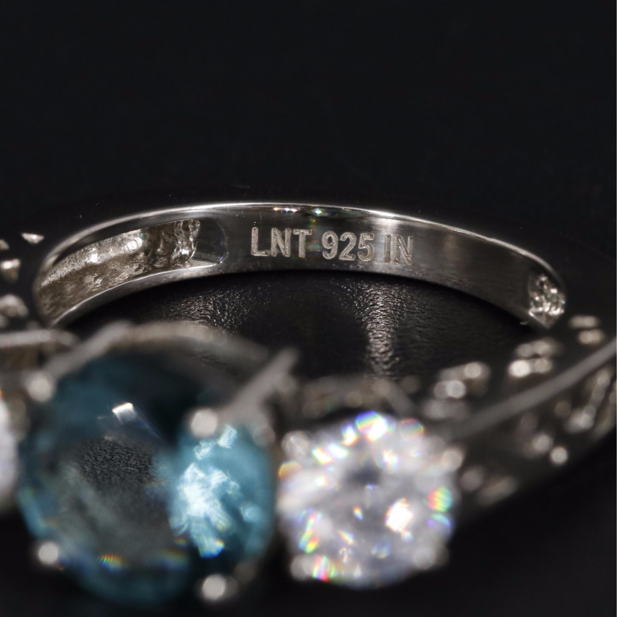 Sterling Topaz and Cubic Zirconia Three Stone Ring