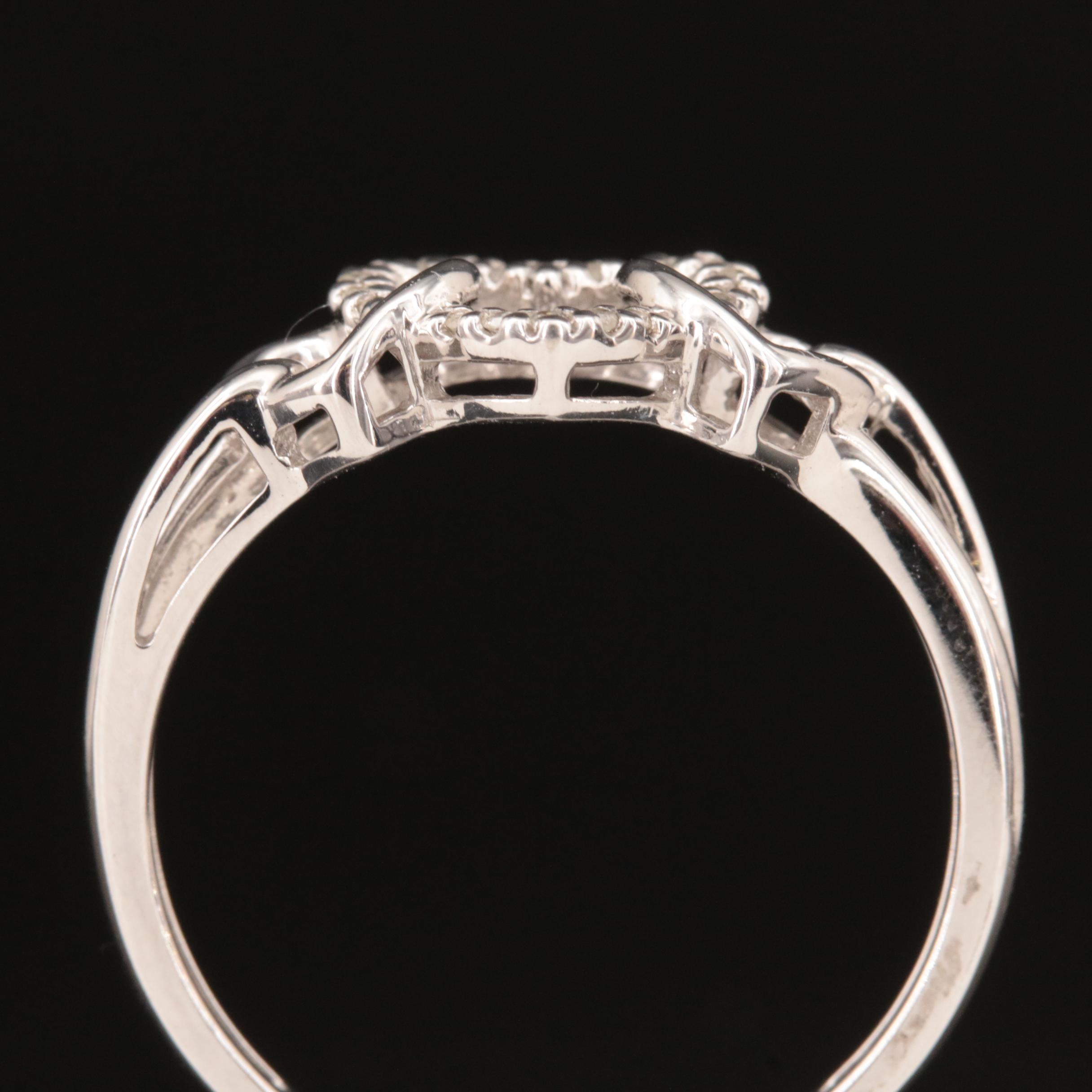 10K 0.05 CTW Diamond Triple Heart Ring