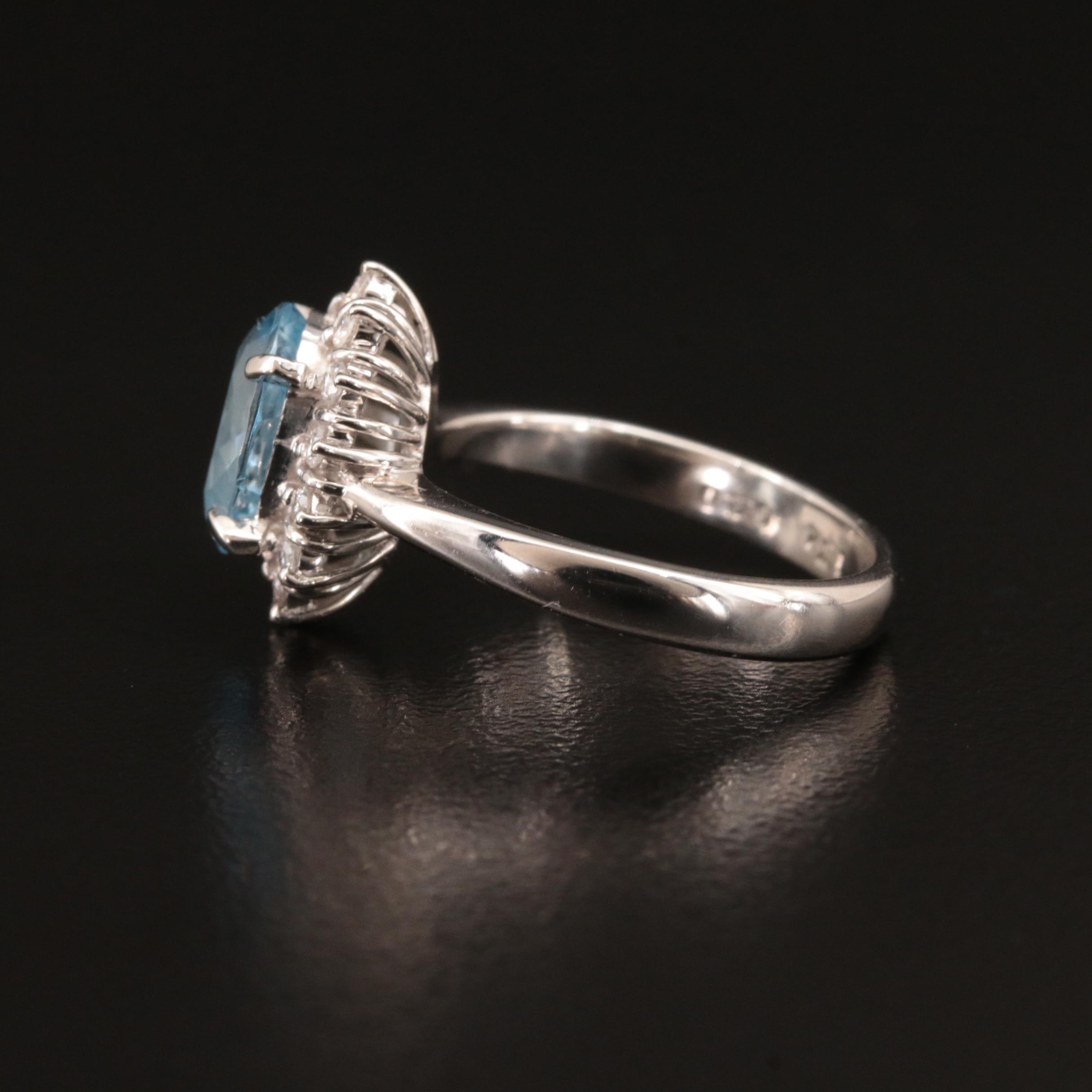 Platinum 1.74 CT Aquamarine and Diamond Halo Ring